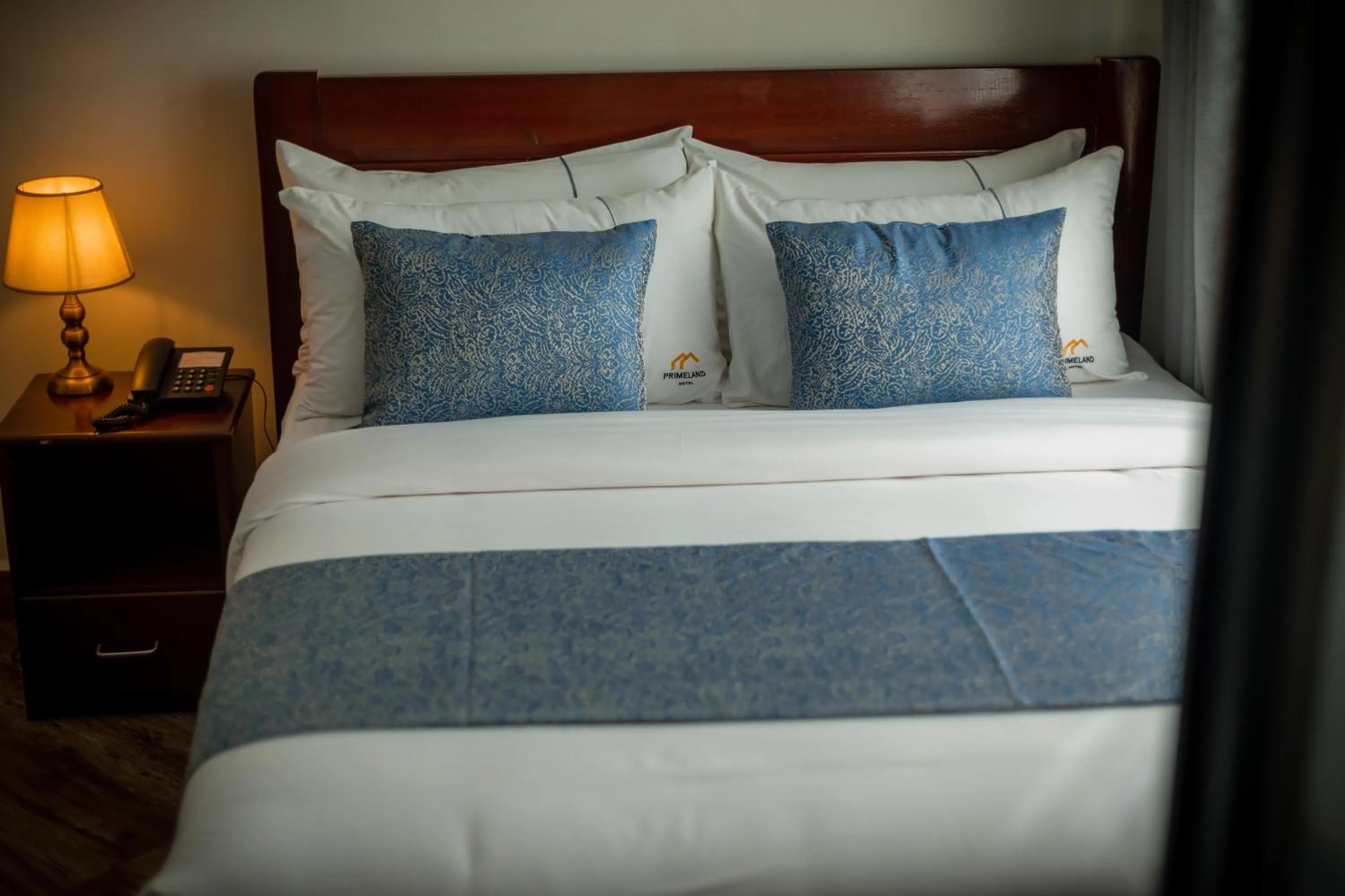 Bed in Primeland Hotel