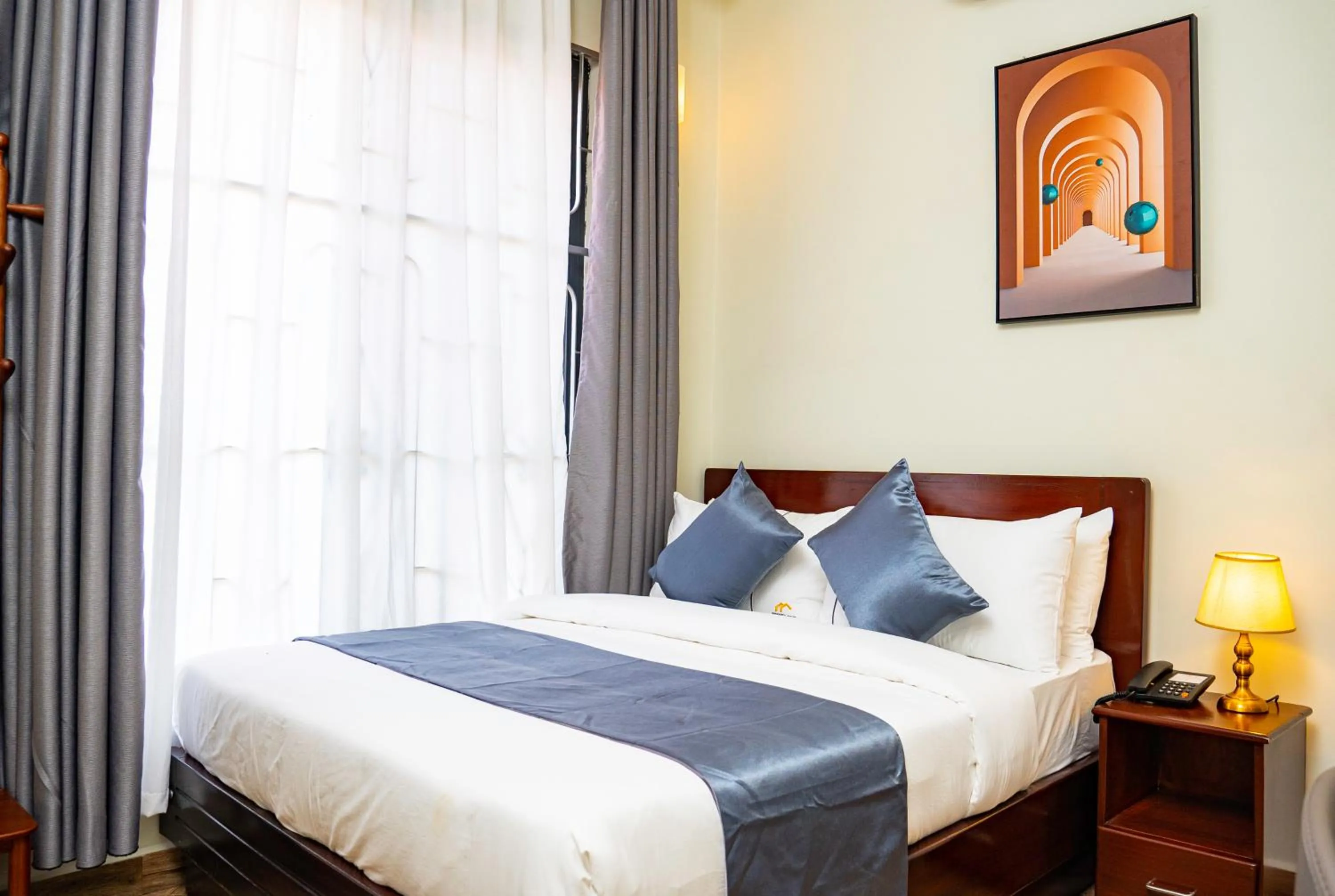 Bed in Primeland Hotel