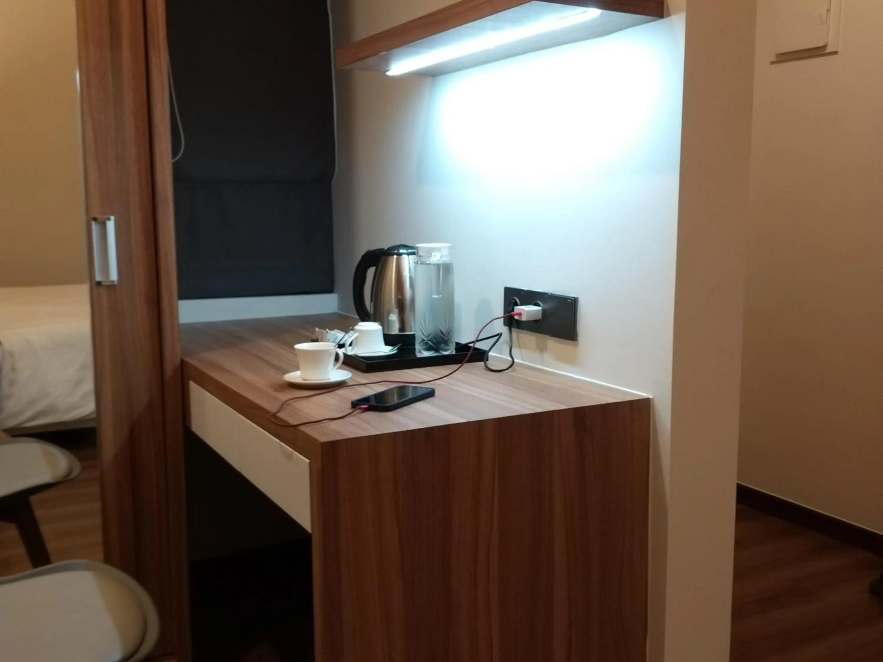 Bedroom in Urbanview Hotel Nardis Living near UMY