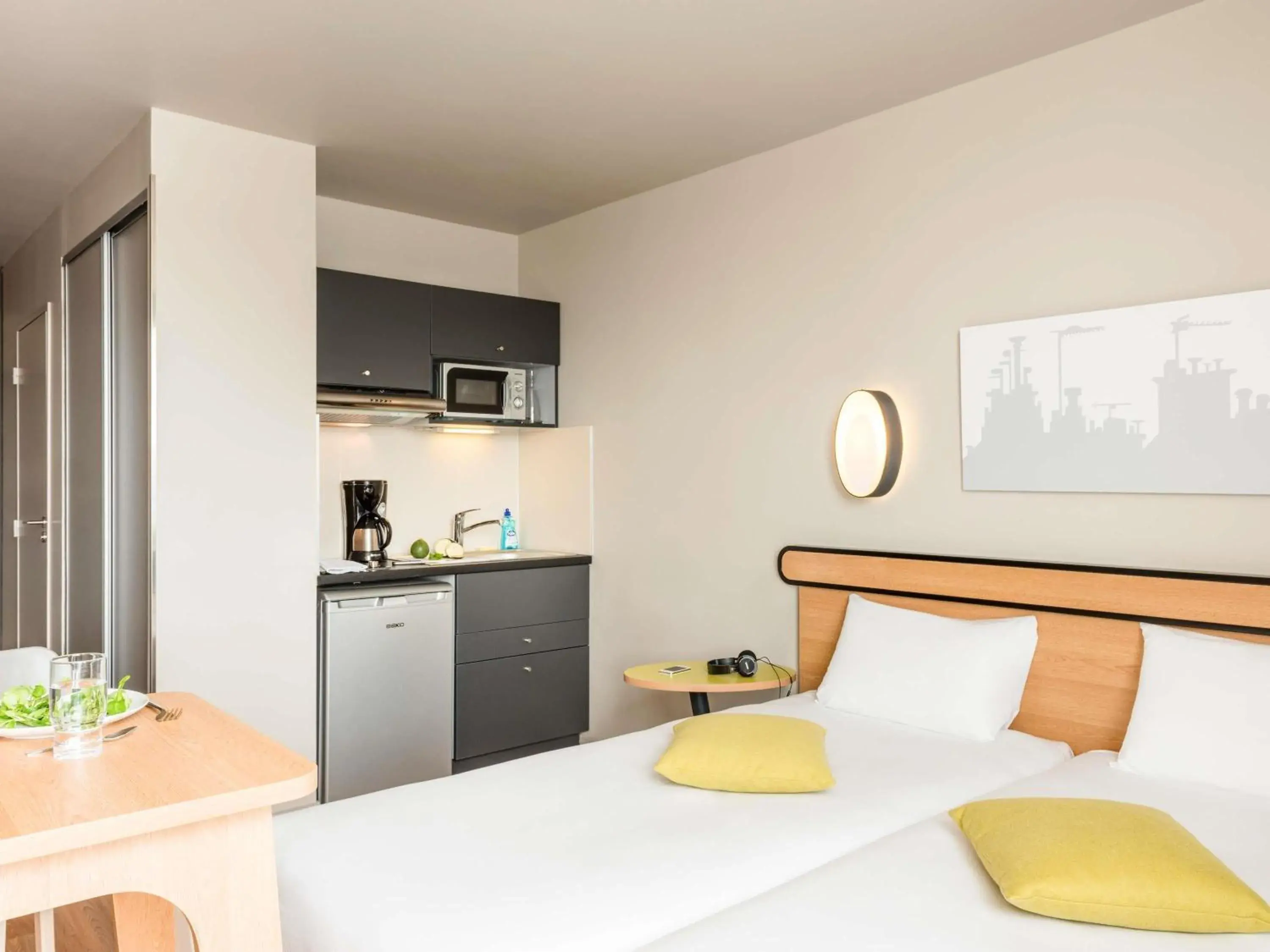 Bedroom, Bed in Aparthotel Adagio Access Paris Massy Gare Bedroom, Bed in Aparthotel Adagio Access Paris Massy Gare