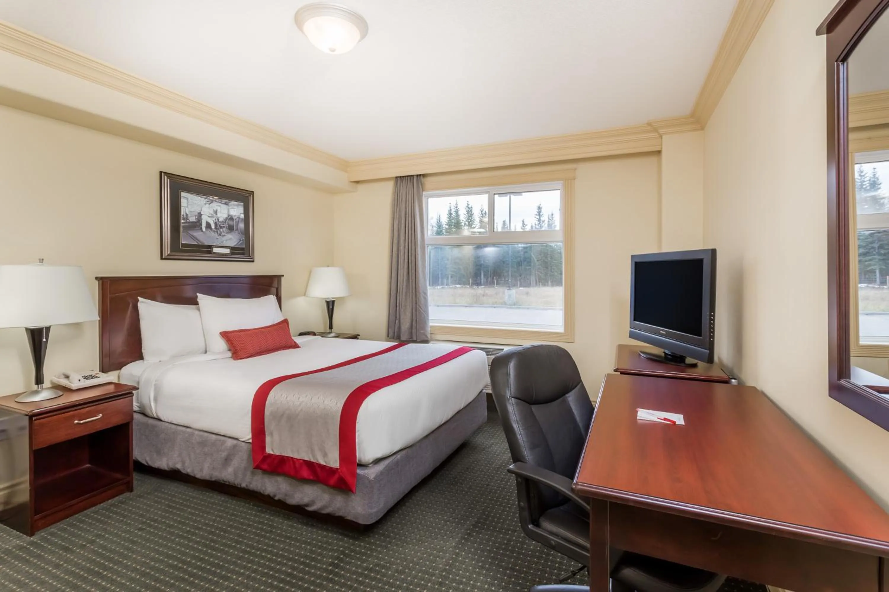 Bathroom, Bed in Ramada by Wyndham Hinton