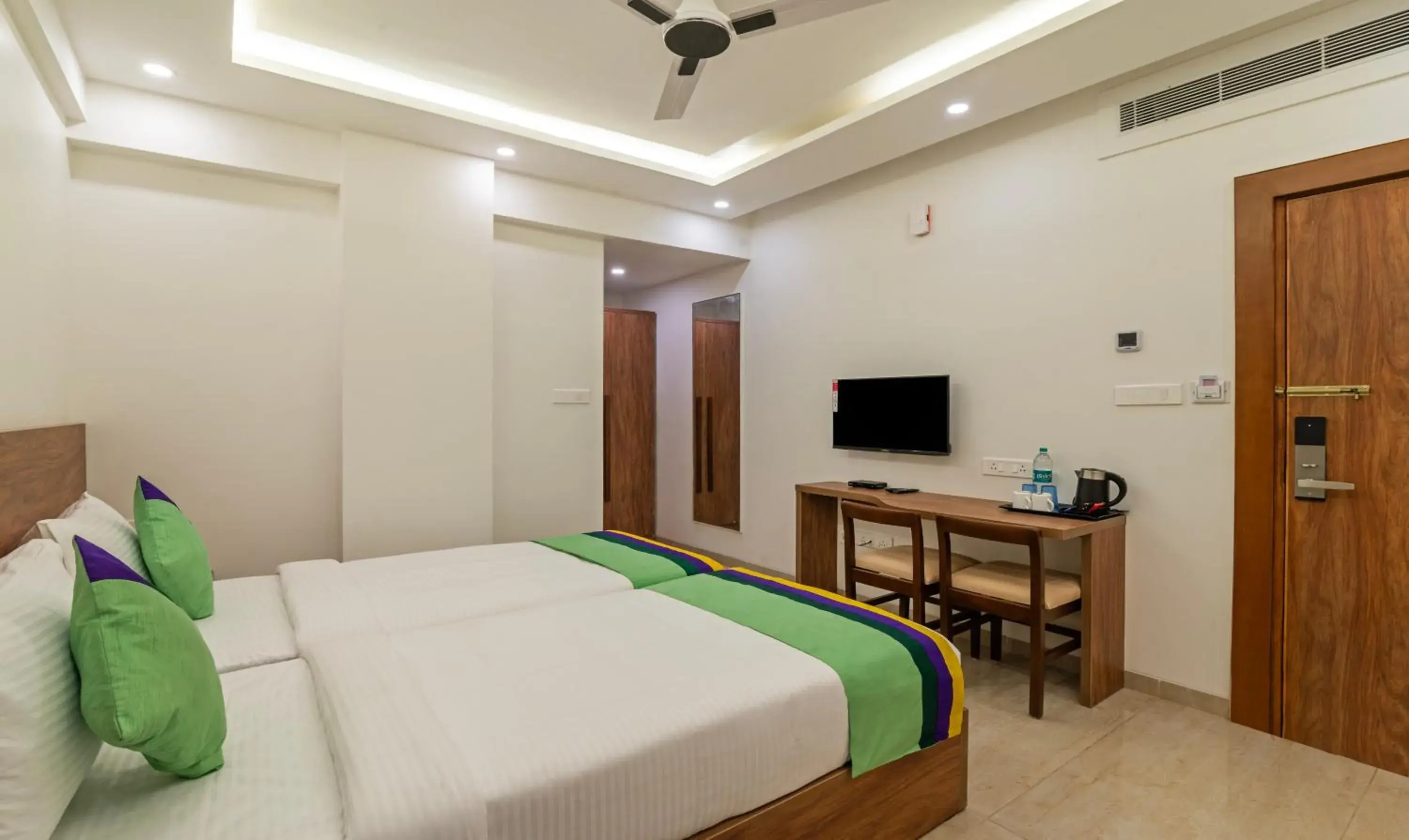 Bedroom, Bed in Treebo Global Stay, Jayanagar Bedroom, Bed in Treebo Global Stay, Jayanagar