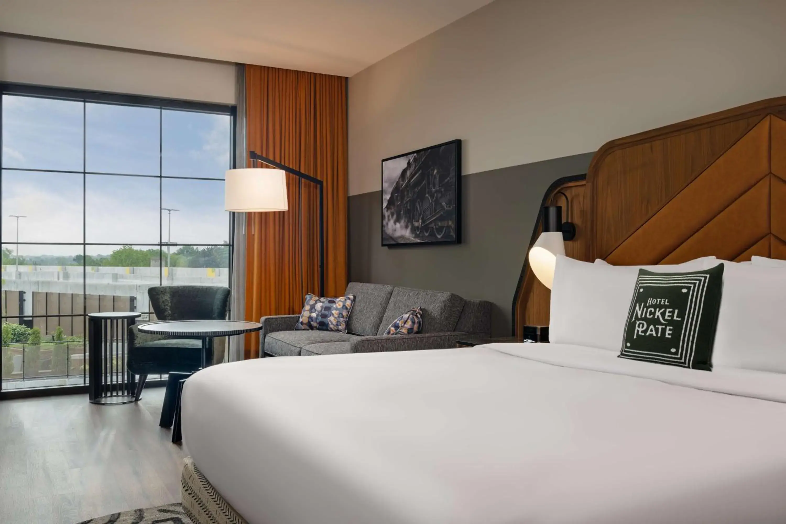 King Room with Sofa Bed in Hotel Nickel Plate Fishers, Tapestry Collection By Hilton King Room with Sofa Bed in Hotel Nickel Plate Fishers, Tapestry Collection By Hilton