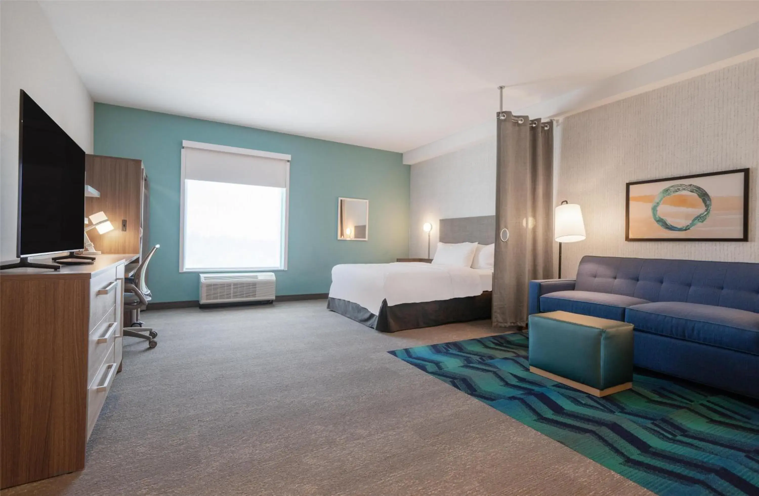 Living room, Bed in Home2 Suites by Hilton Fort Walton Beach Eglin AirForce Base Living room, Bed in Home2 Suites by Hilton Fort Walton Beach Eglin AirForce Base