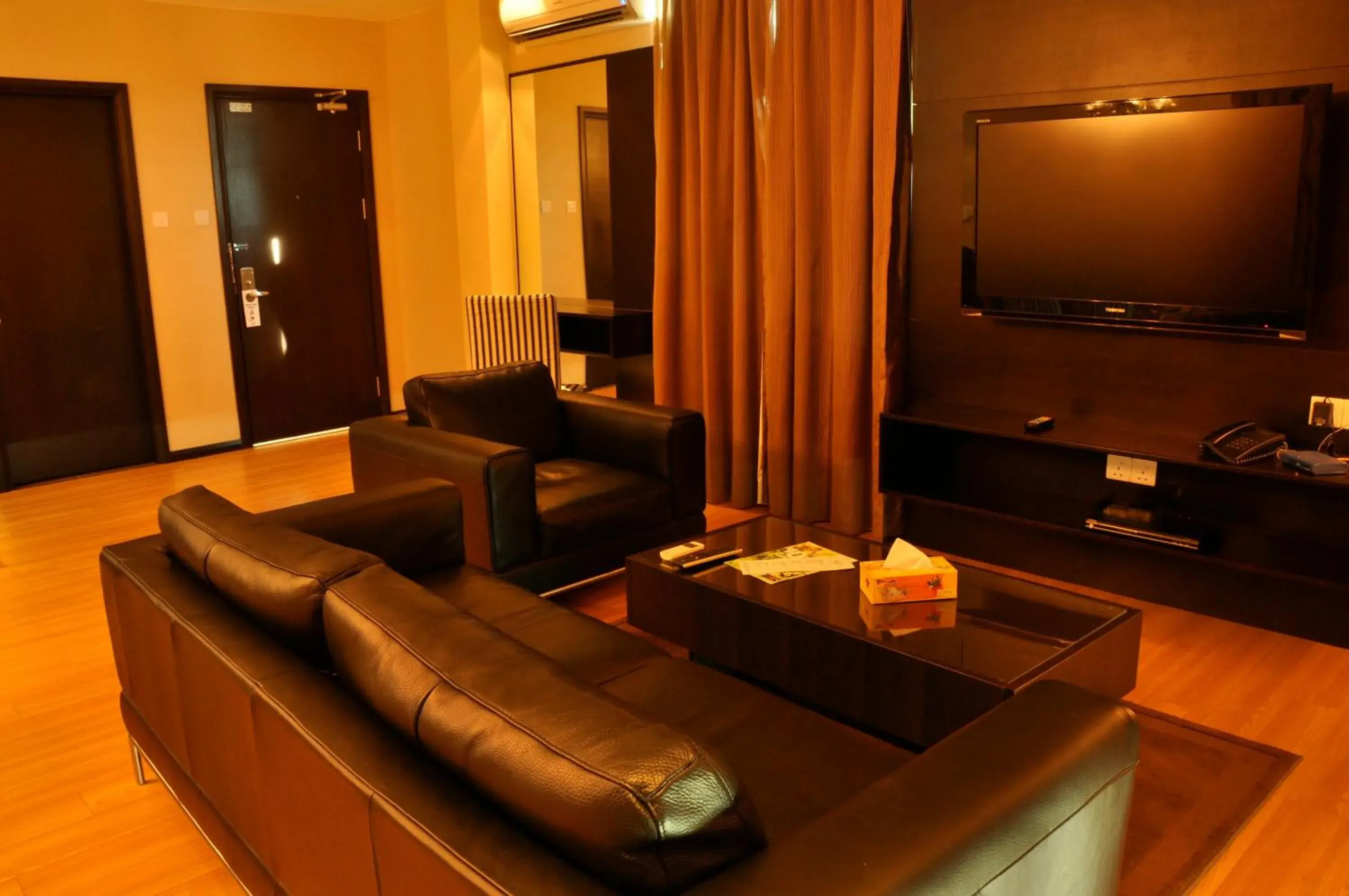 Living room in Tat Place Hotel Living room in Tat Place Hotel