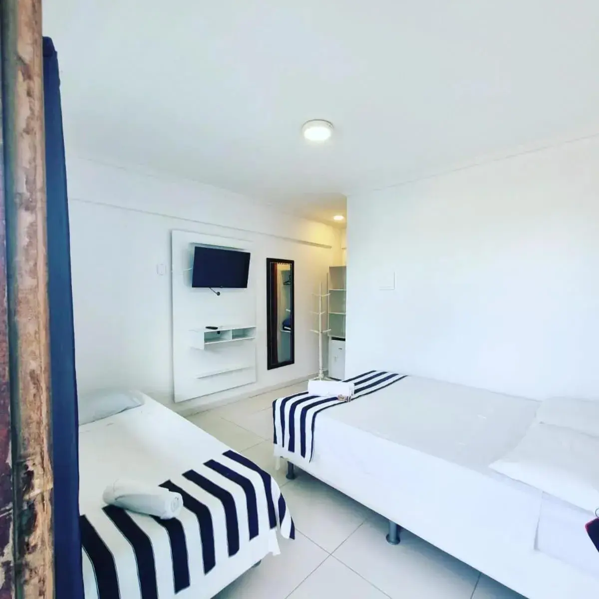 Photo of the whole room, Bed in Terra Nova Cabo Frio Front Beach Photo of the whole room, Bed in Terra Nova Cabo Frio Front Beach