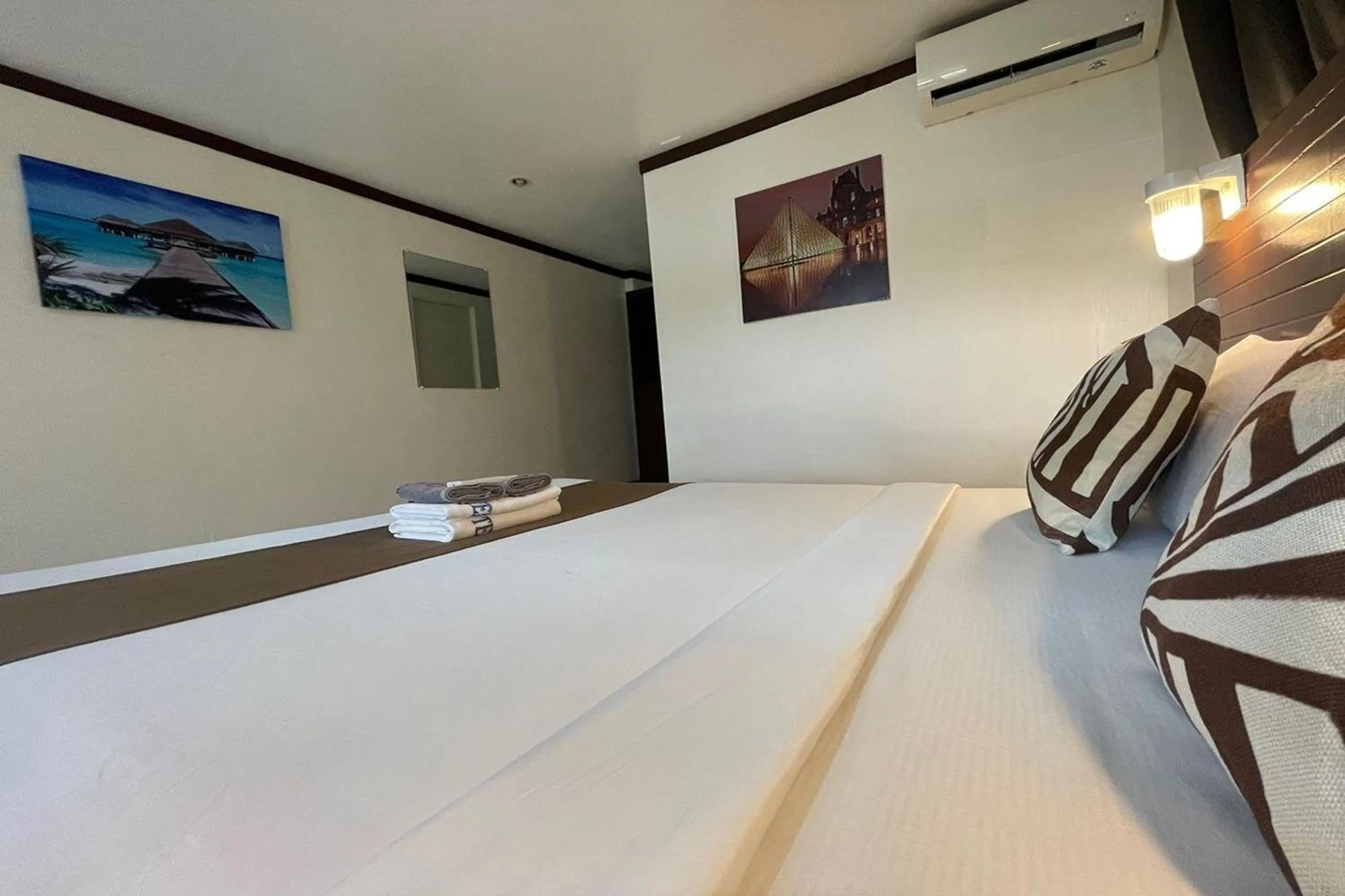 Bed in Angeles Palace Hotel