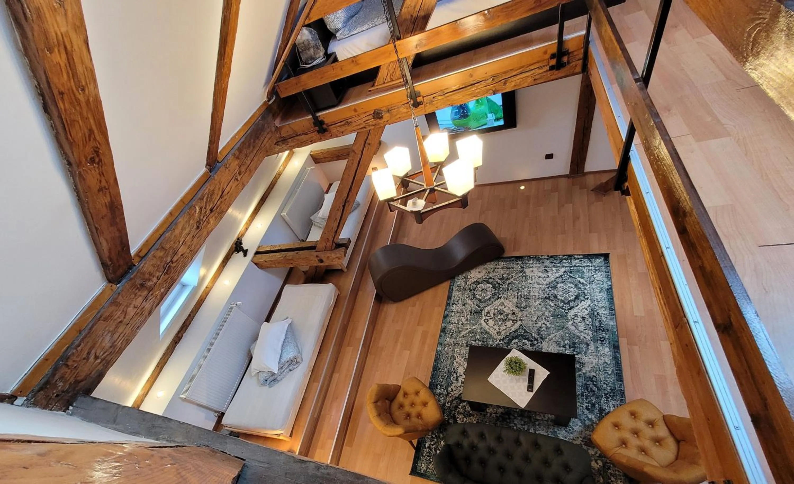 Seating area, Bed in Main Square Apartments & More