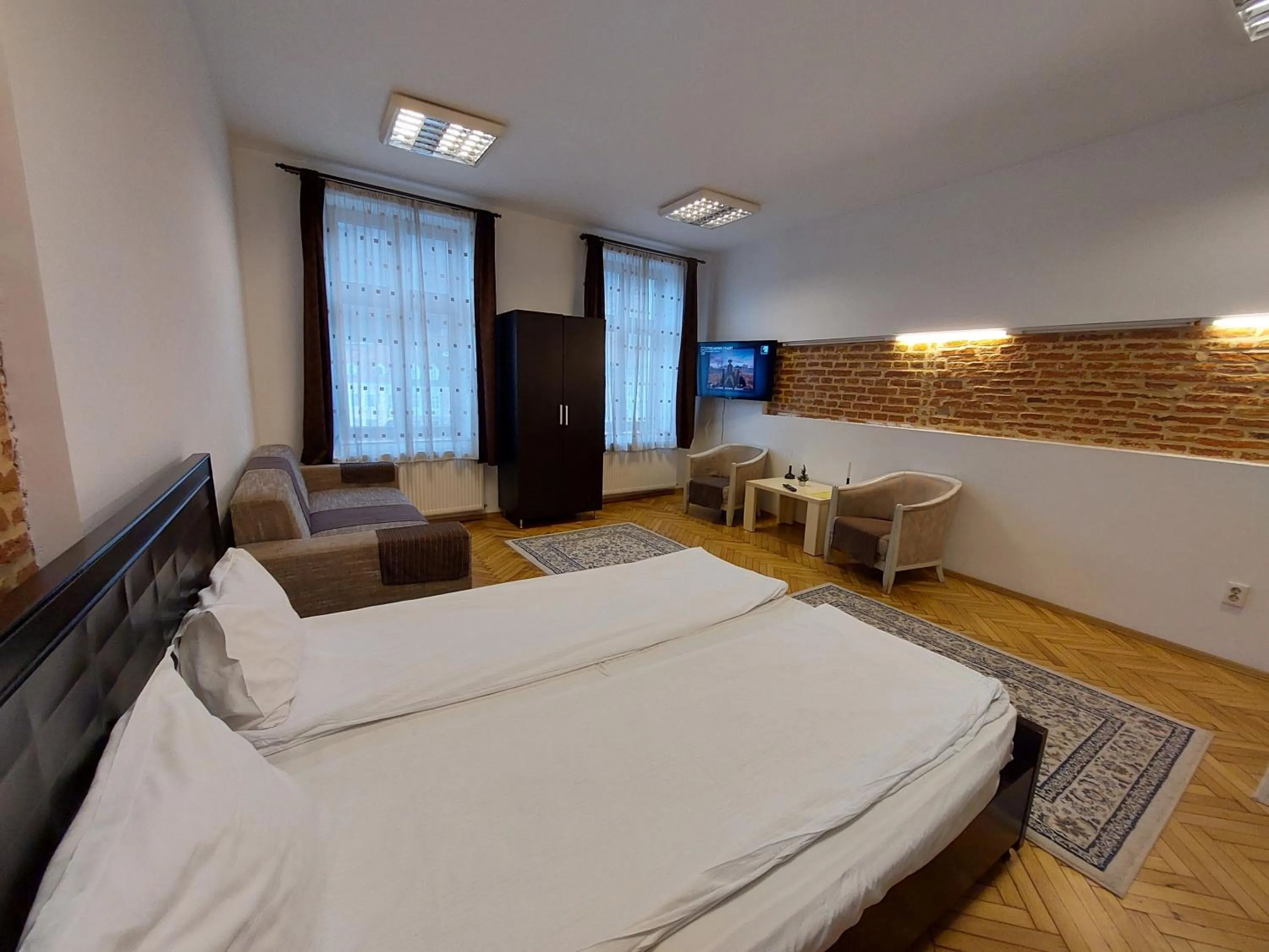 Photo of the whole room, Bed in Main Square Apartments & More