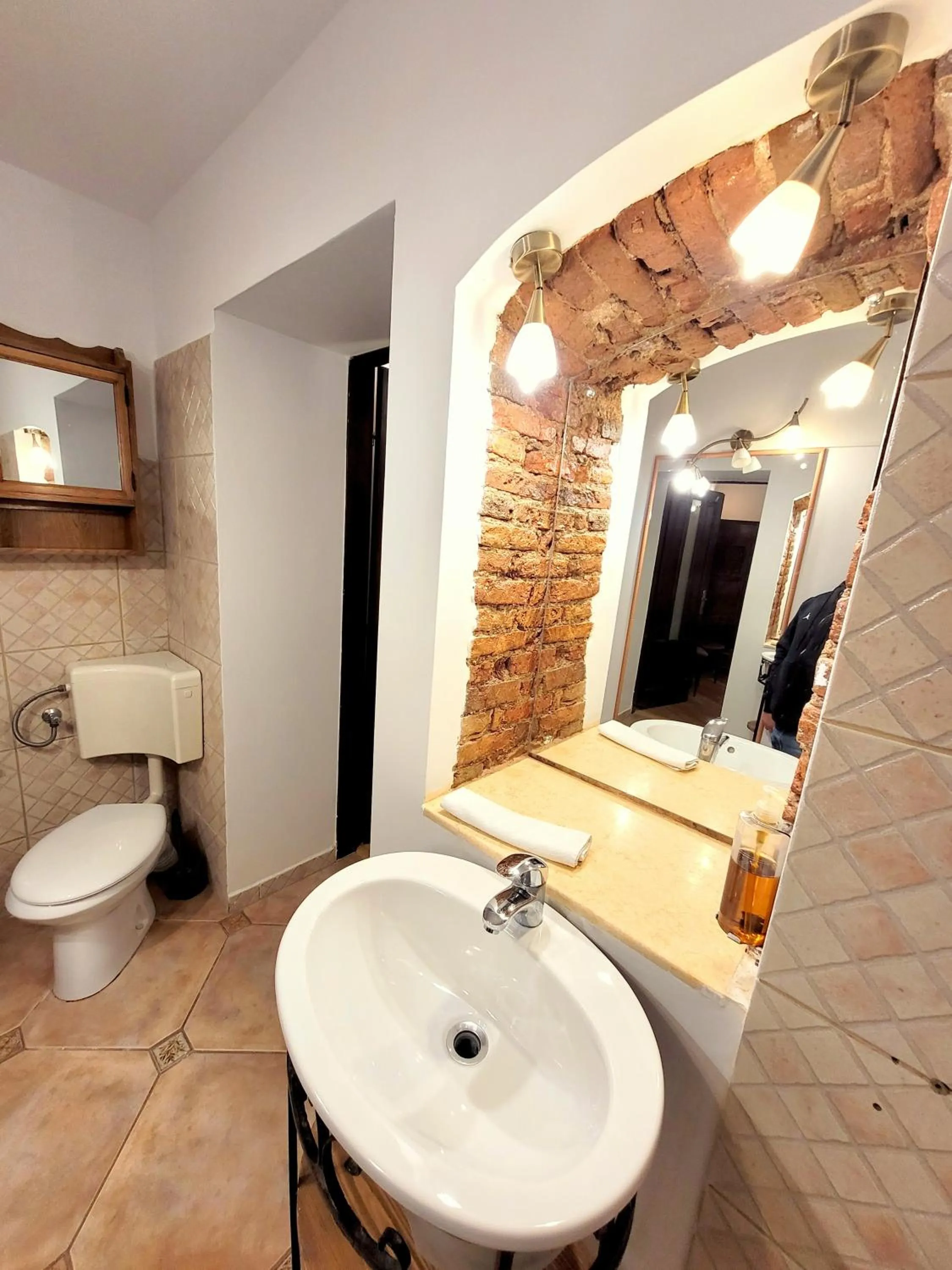 Bathroom in Main Square Apartments & More