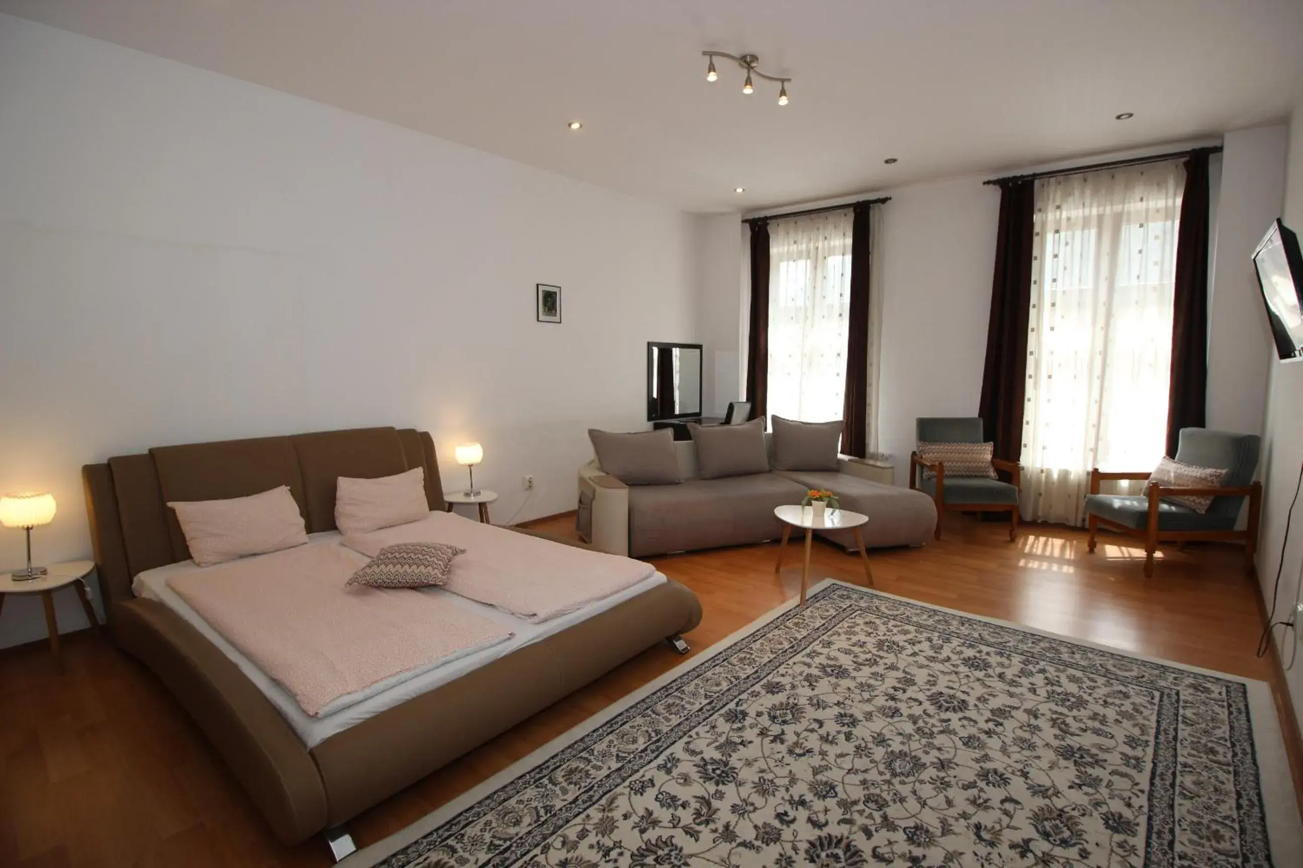 Living room, Bed in Main Square Apartments & More Living room, Bed in Main Square Apartments & More