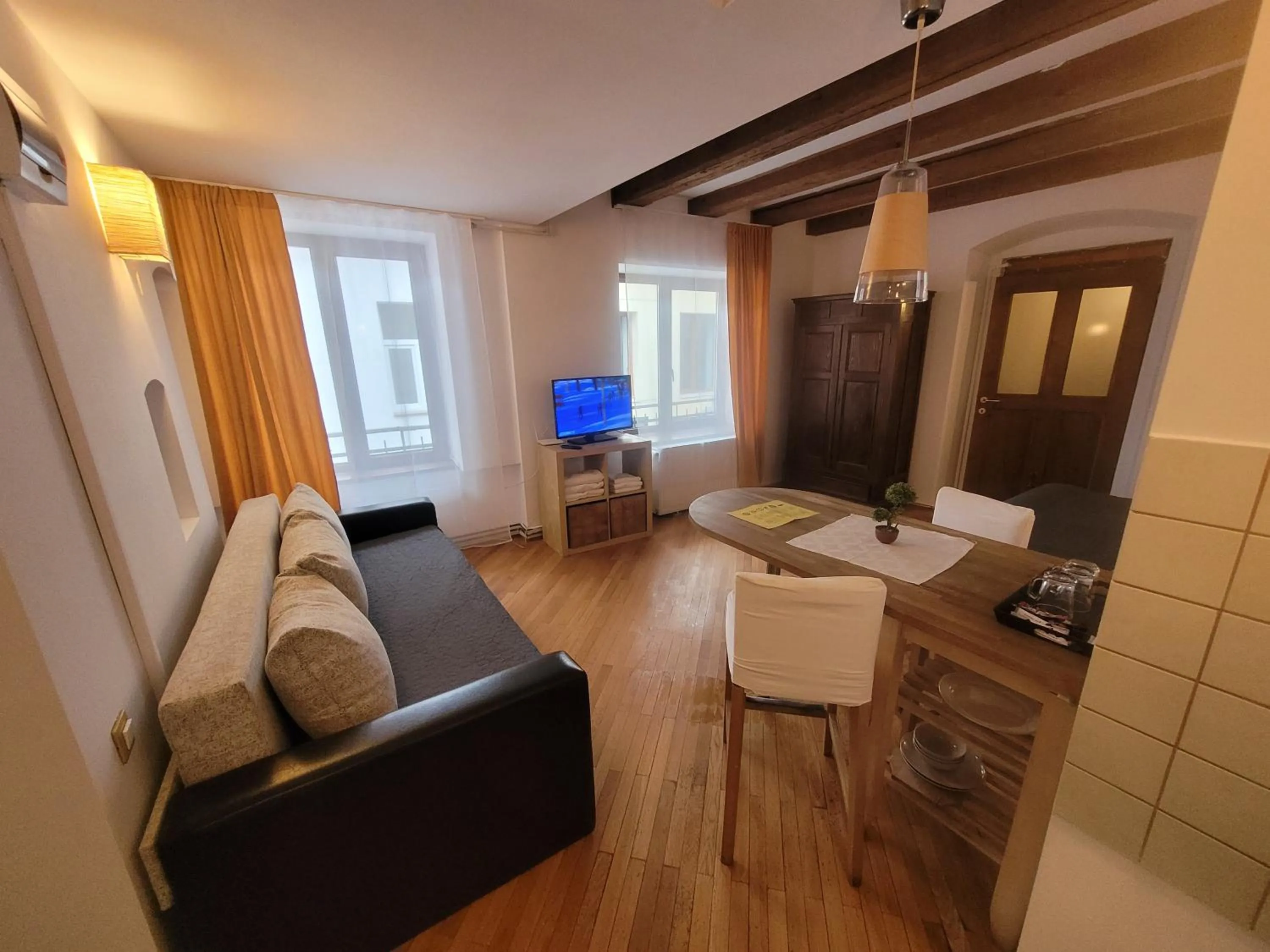 Seating area in Main Square Apartments & More