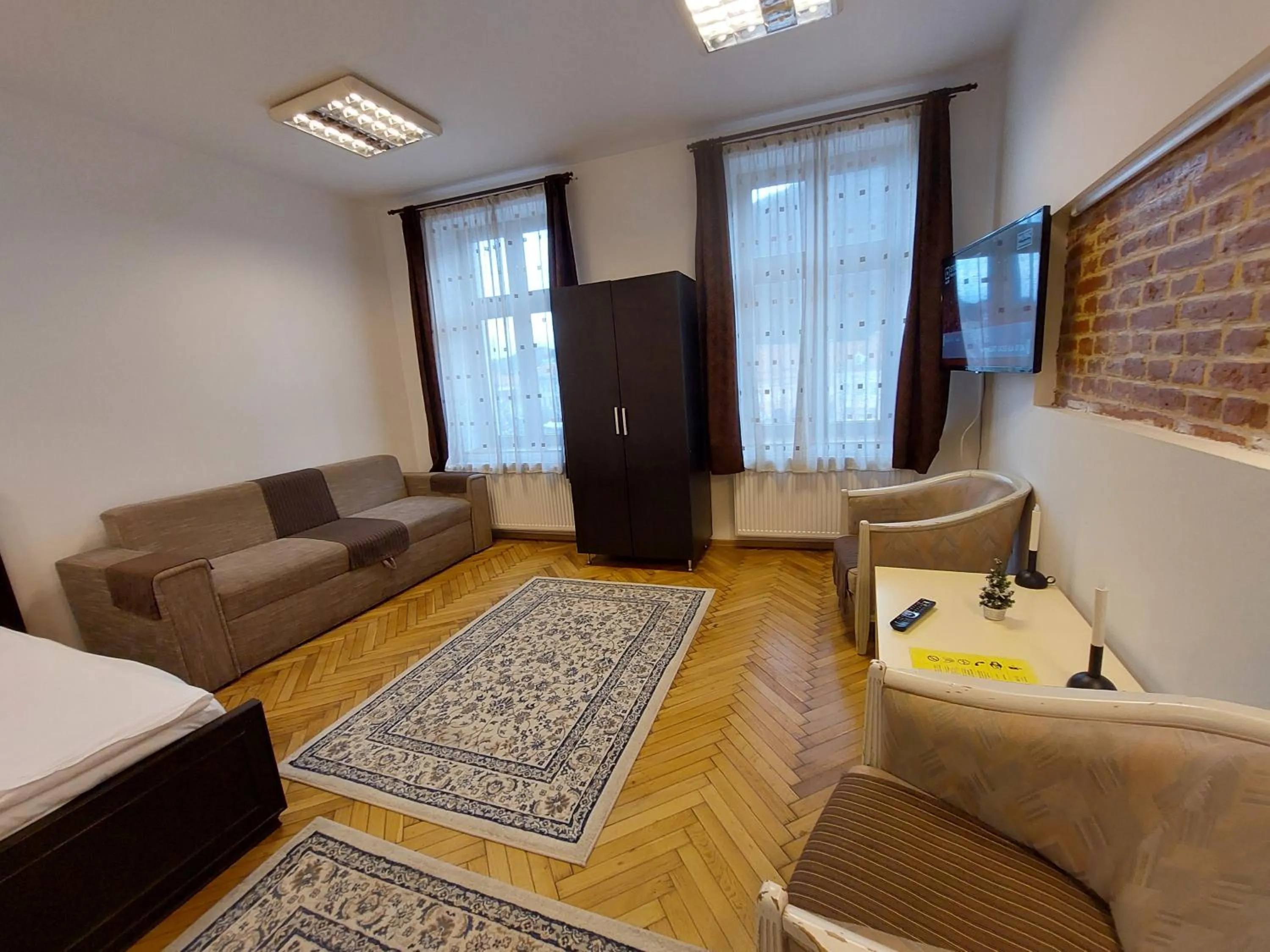 Photo of the whole room in Main Square Apartments & More
