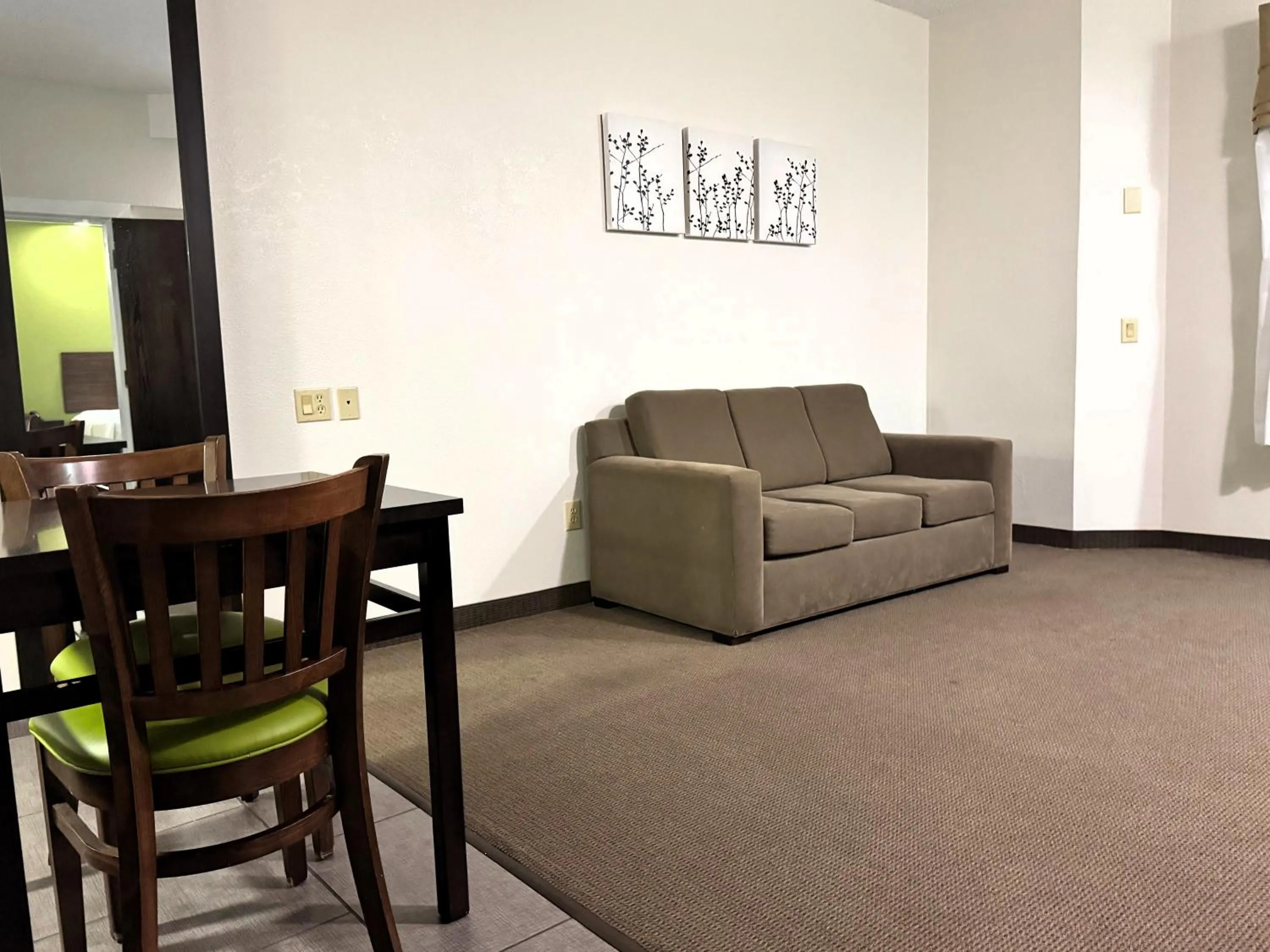 Seating area in Travelodge by Wyndham Flowood