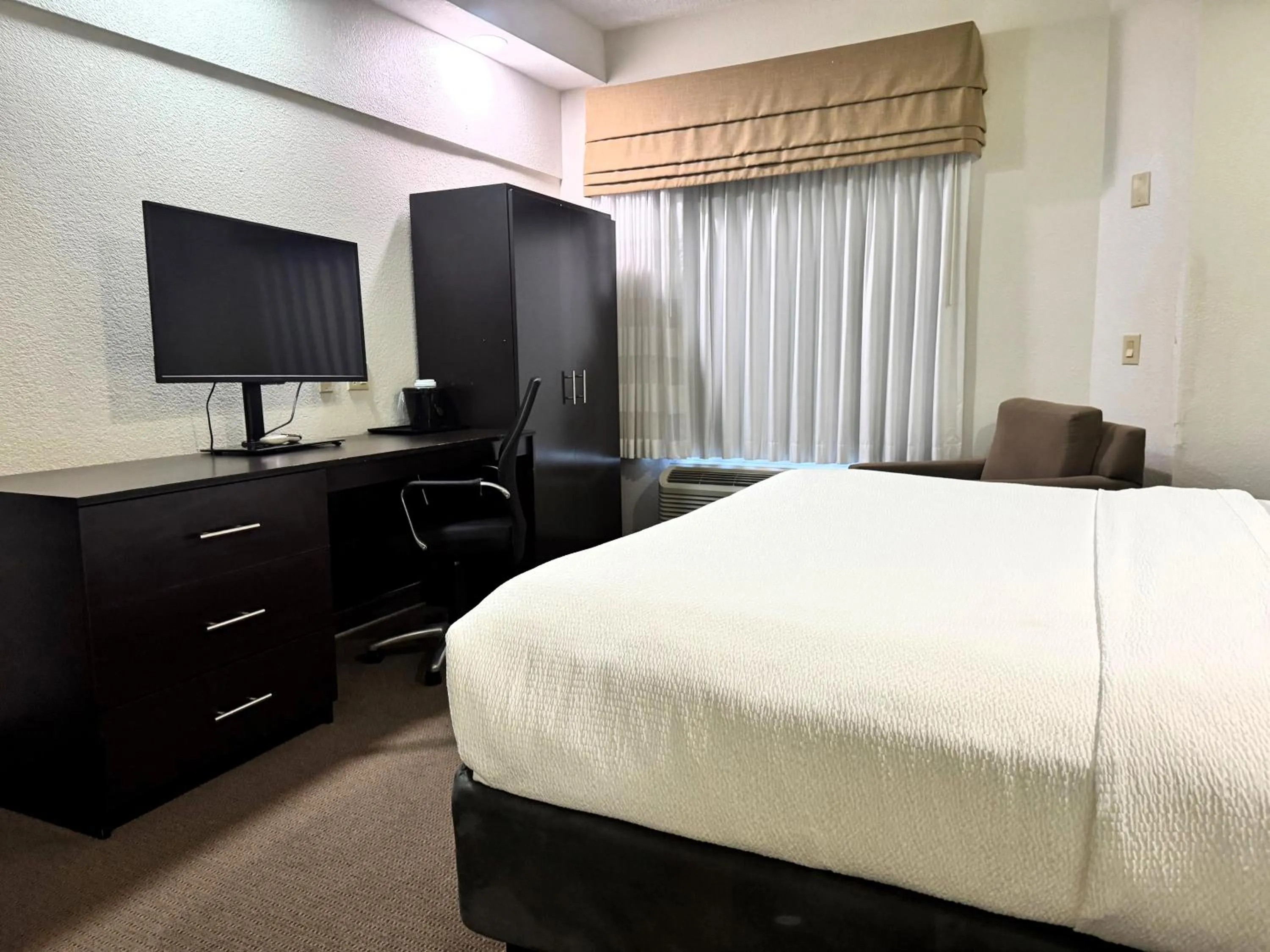 Photo of the whole room, Bed in Travelodge by Wyndham Flowood