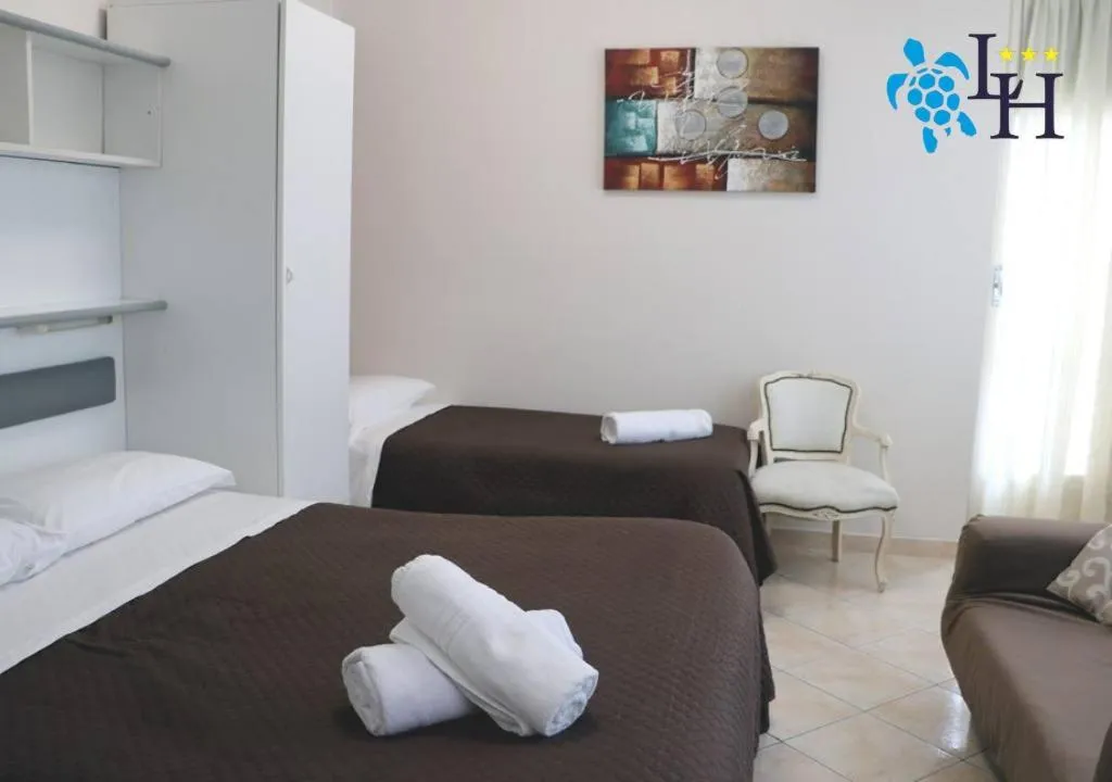 Bed in Hotel Lora RDA Luxury