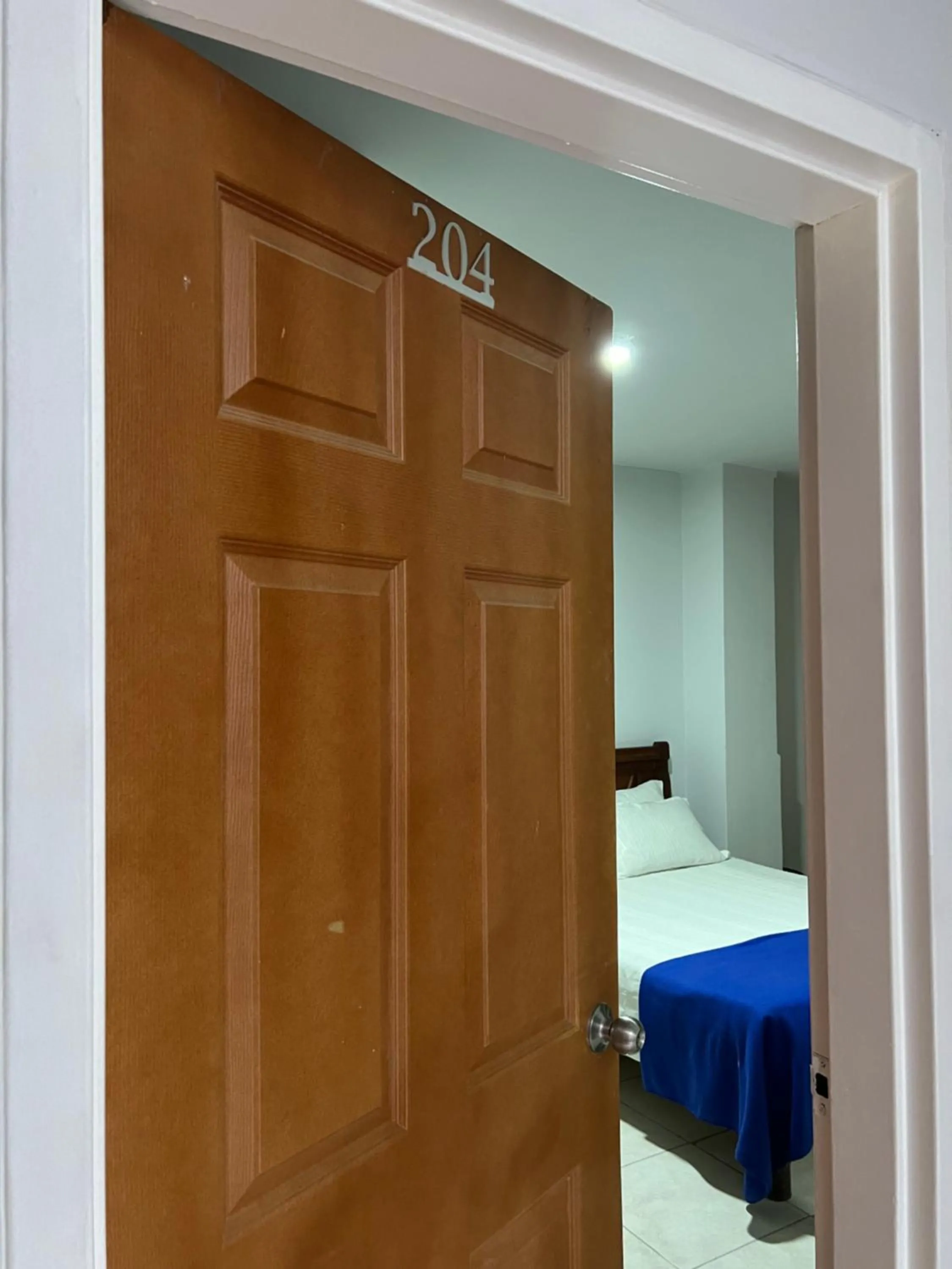 Photo of the whole room, Bed in HOTEL ARMENIA CENTRO , TENEMOS AGUA CALIENTE y FACTURACION ELECTRONICA, Gracias