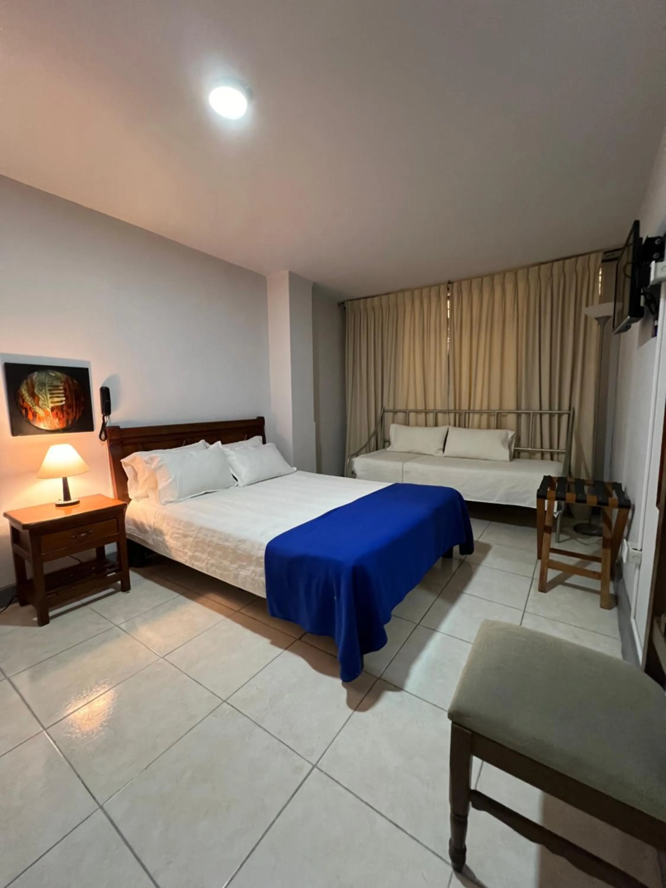 Photo of the whole room, Bed in HOTEL ARMENIA CENTRO , TENEMOS AGUA CALIENTE y FACTURACION ELECTRONICA, Gracias