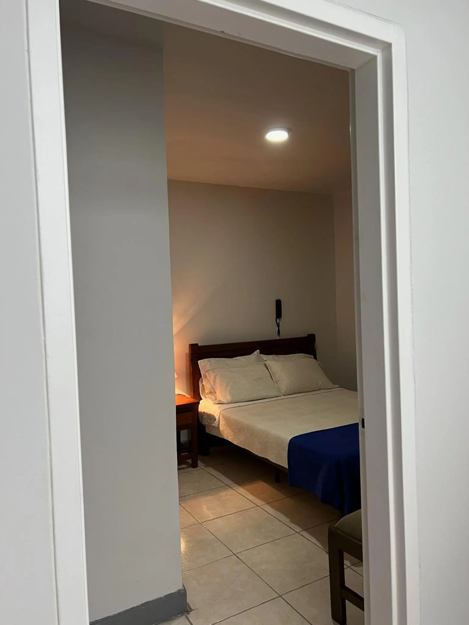 Photo of the whole room, Bed in HOTEL ARMENIA CENTRO , TENEMOS AGUA CALIENTE y FACTURACION ELECTRONICA, Gracias