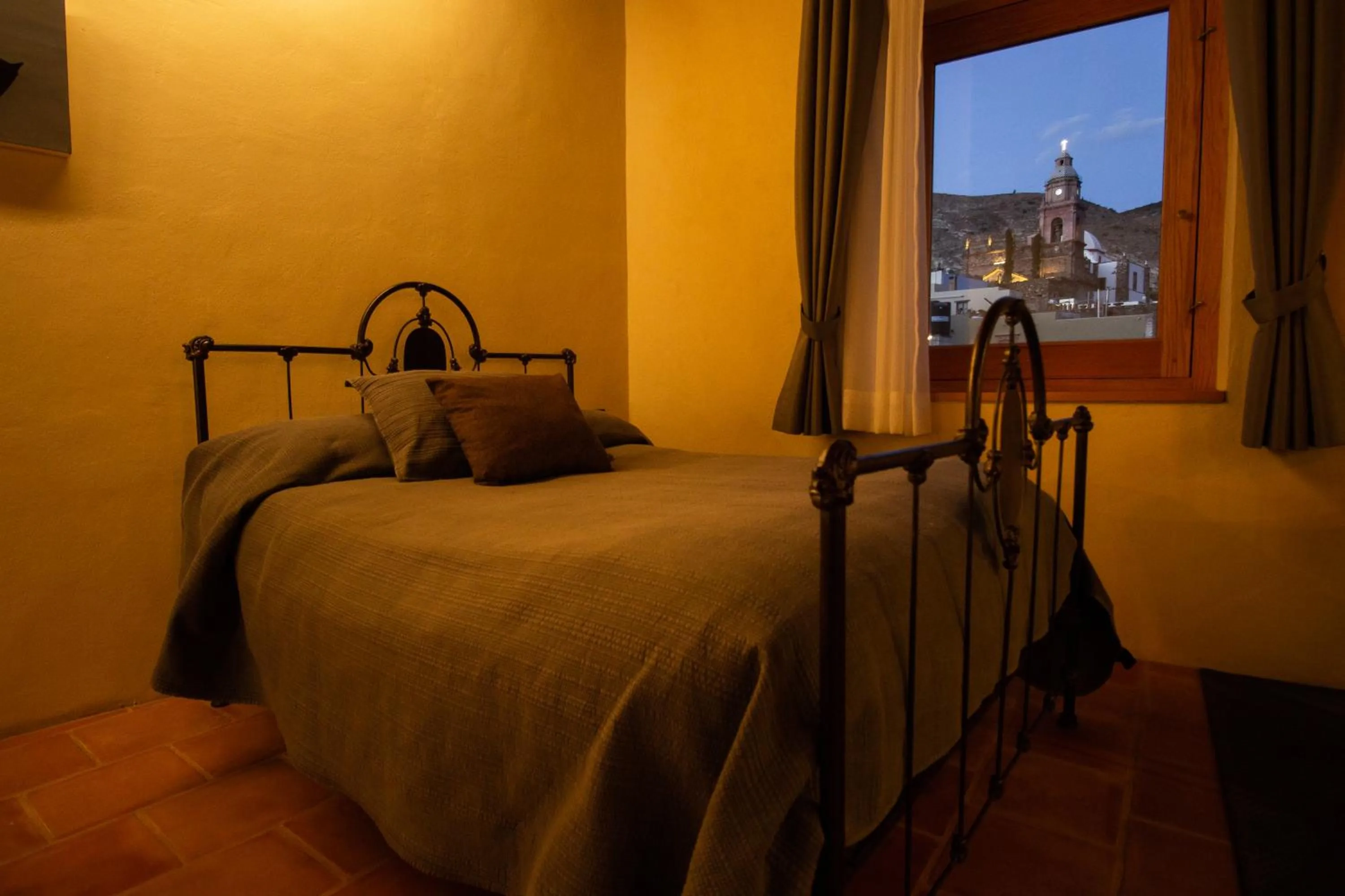 Bed in Hotel La Tarjea