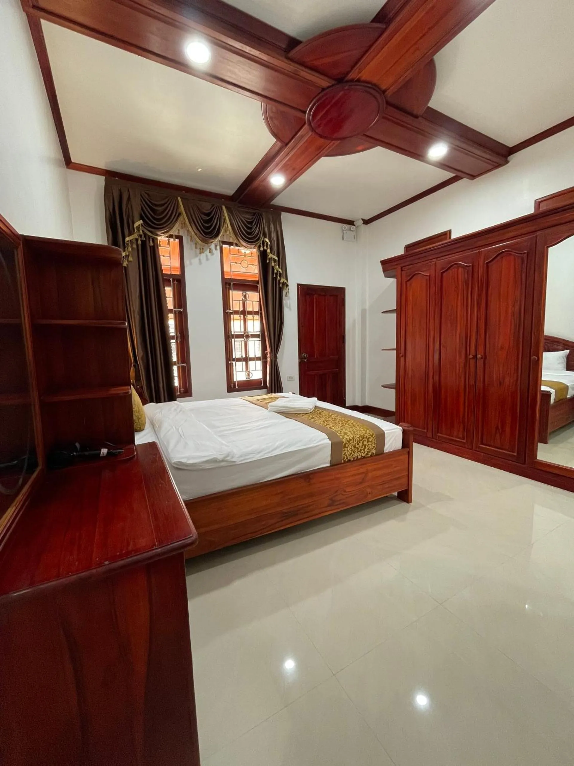 Photo of the whole room, Bed in PhaiLin Hotel