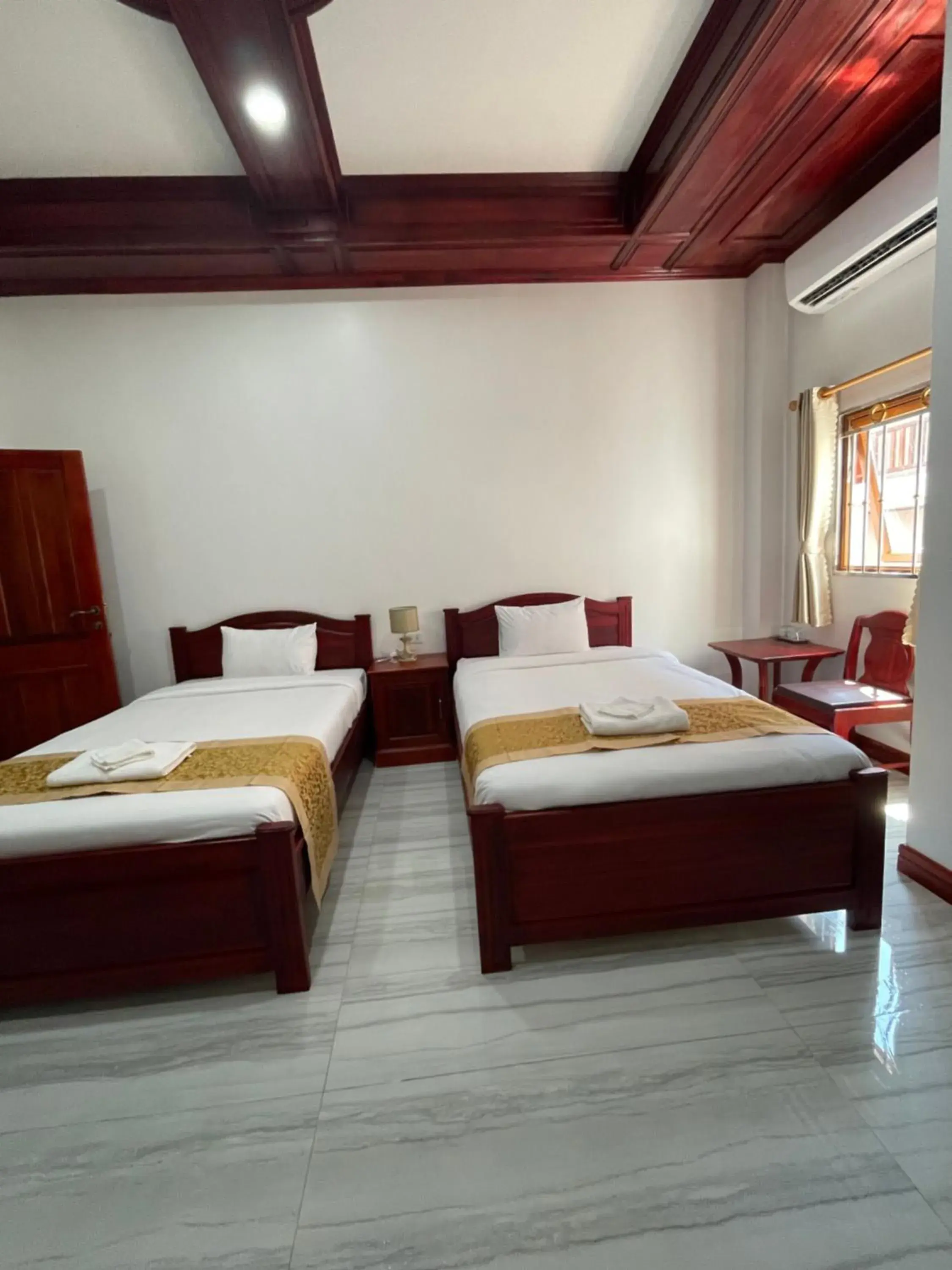 Photo of the whole room, Bed in PhaiLin Hotel Photo of the whole room, Bed in PhaiLin Hotel