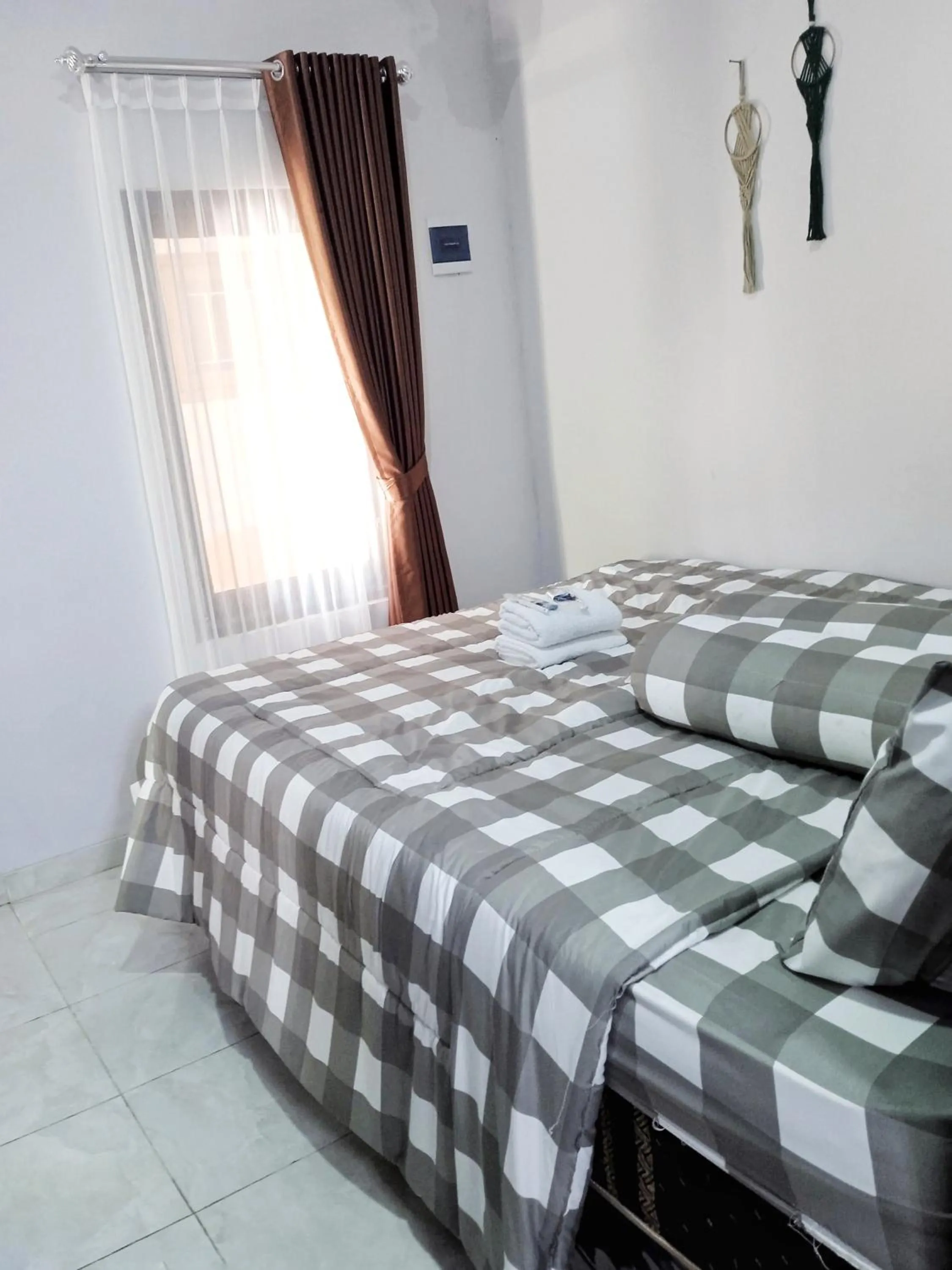 Bed in Liefly Prambanan Villa