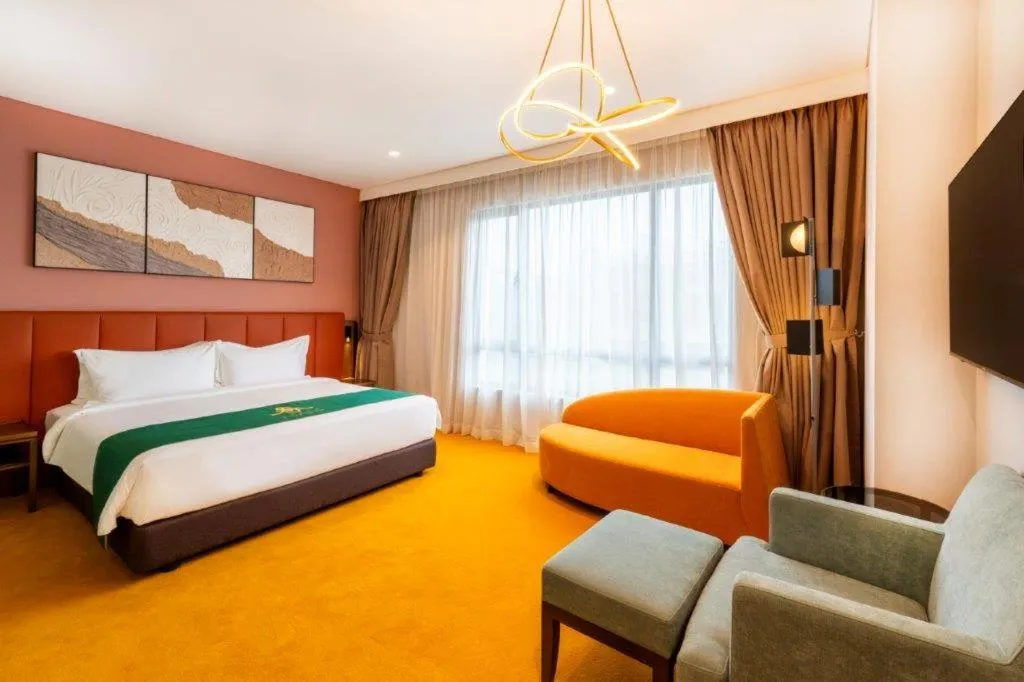 Bed in Arena Premier Hotel