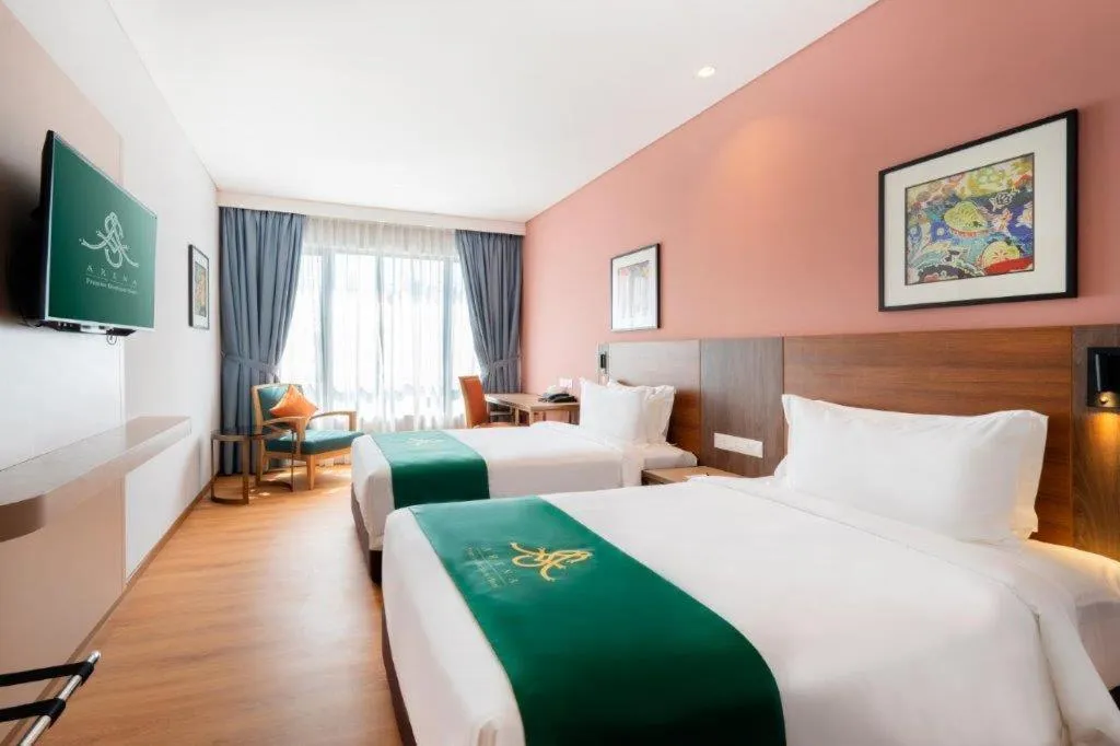 Bed in Arena Premier Hotel