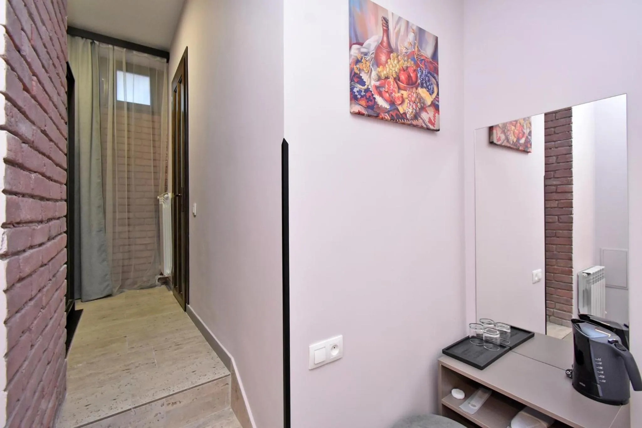 TV and multimedia in Avenue 23 Boutique Hotel