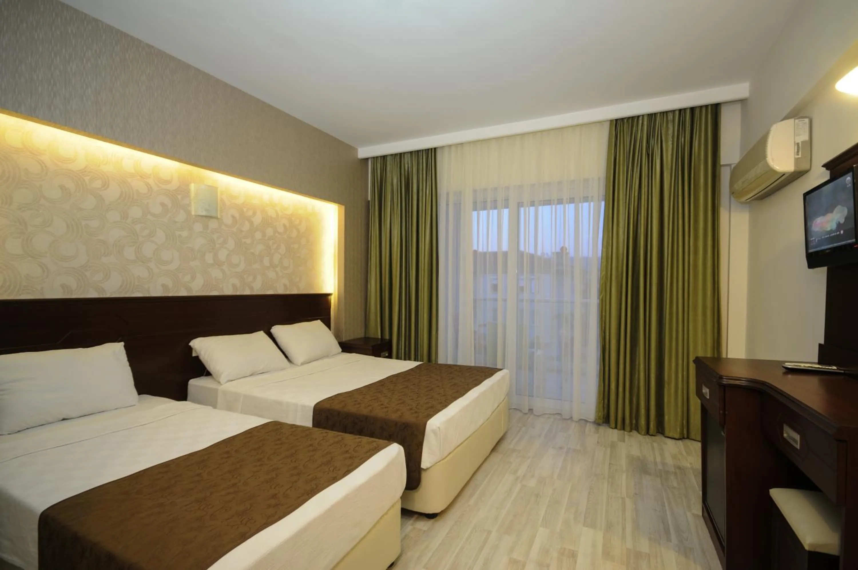 Bedroom in Palmea Hotel