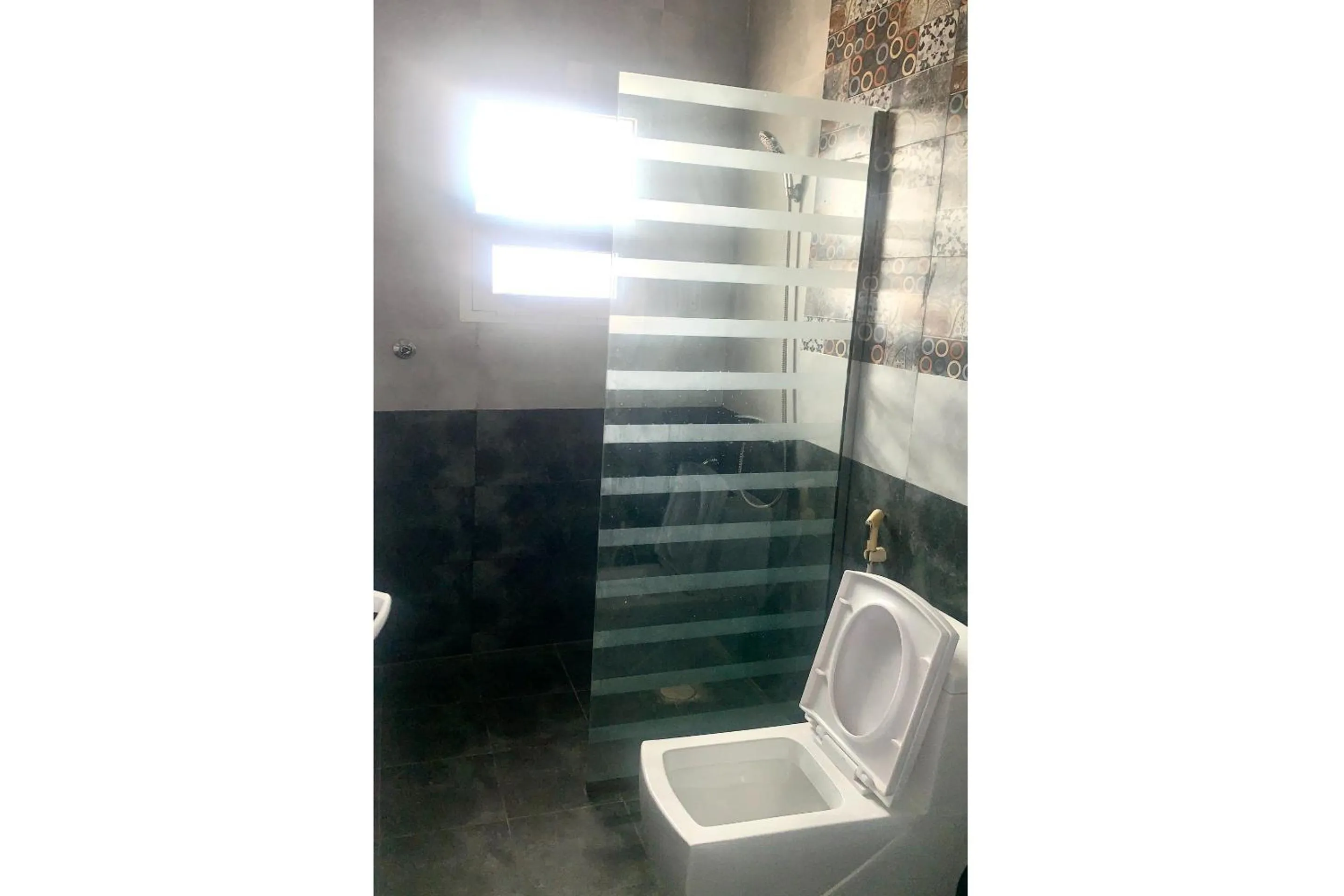 Bathroom in OYO 157 Dream Barka Hotel