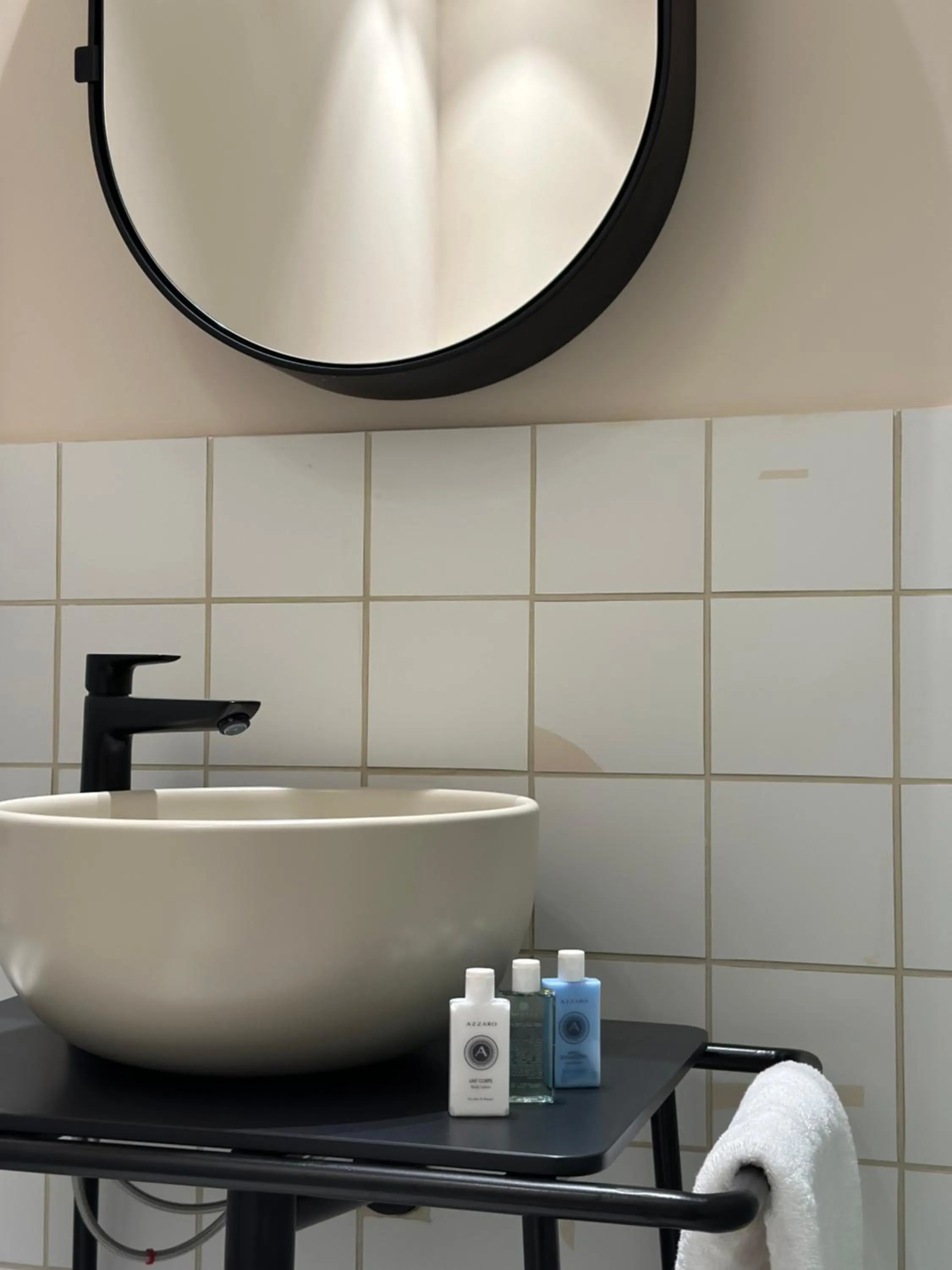 Bathroom in AIONION RESIDENCES by K&K