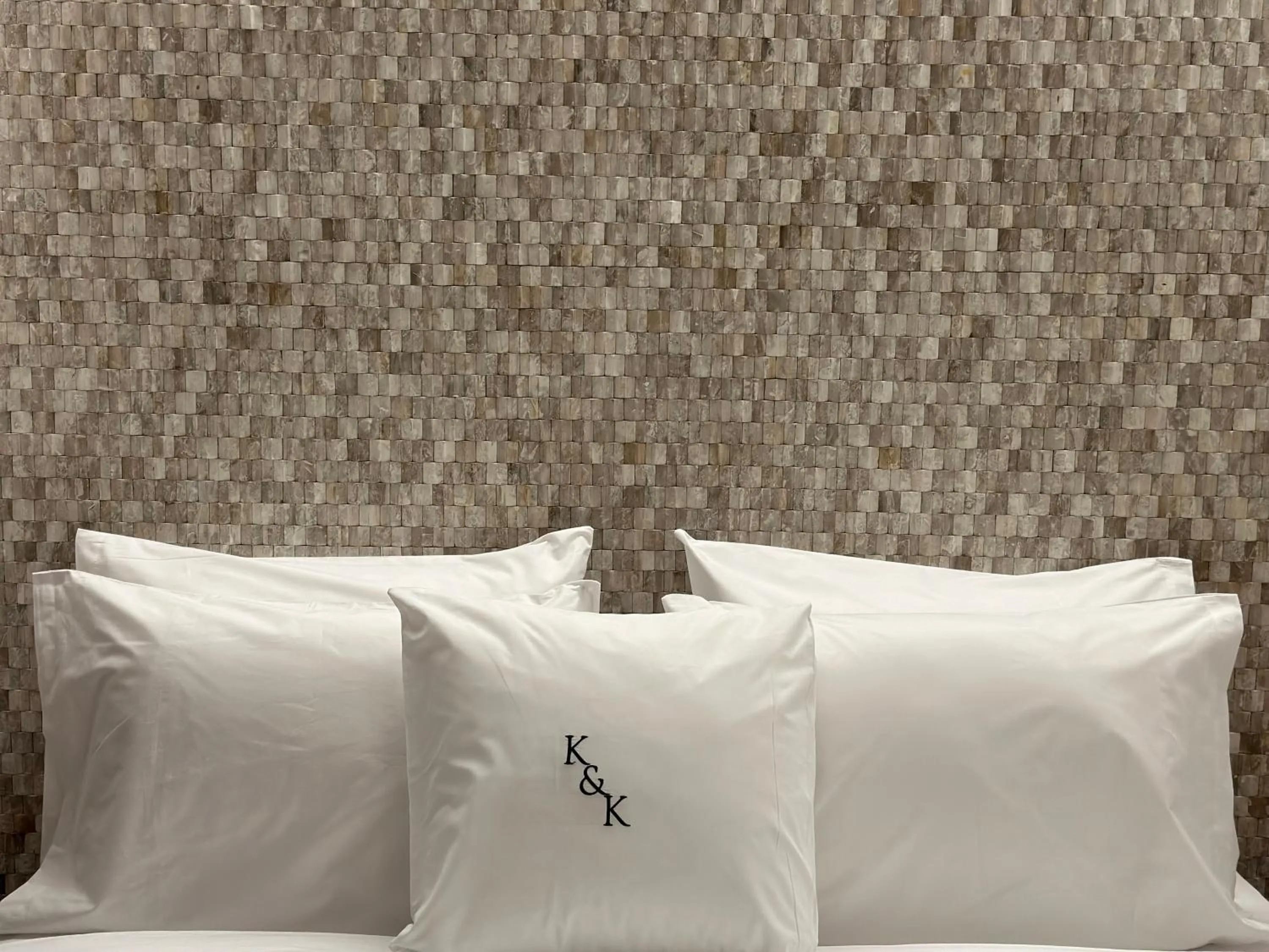 Bed in AIONION RESIDENCES by K&K