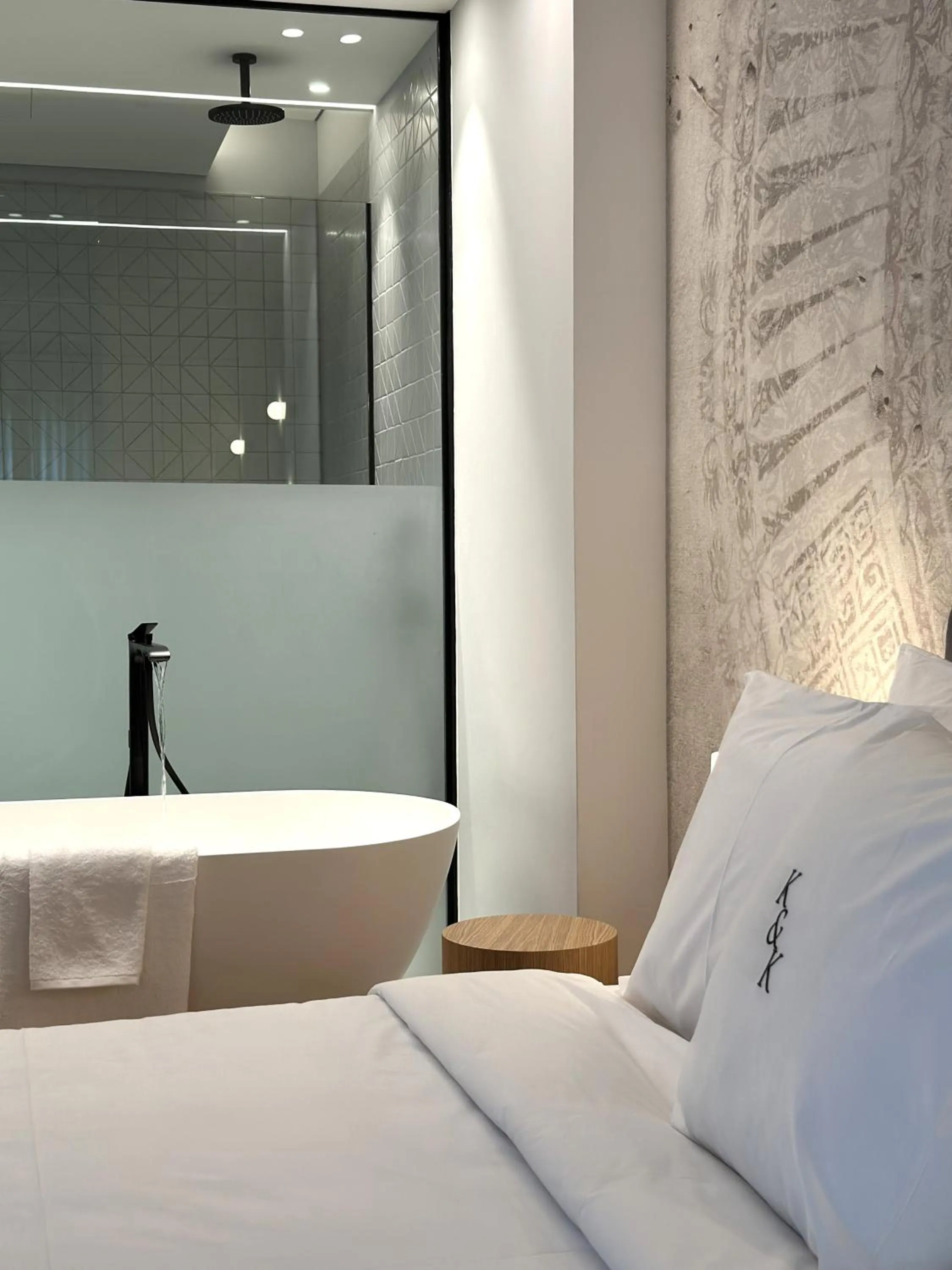 Bathroom, Bed in AIONION RESIDENCES by K&K