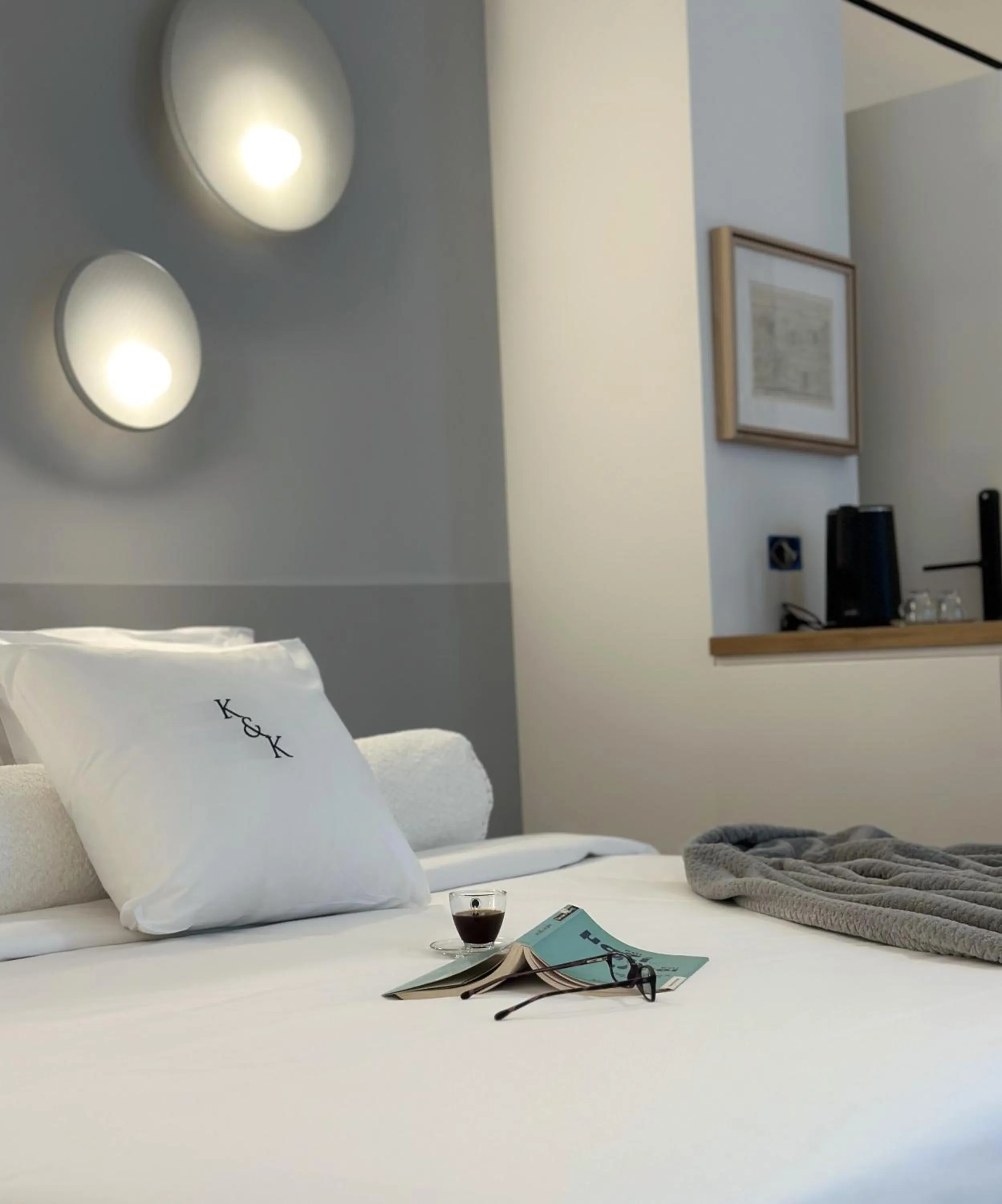 Bed in AIONION RESIDENCES by K&K