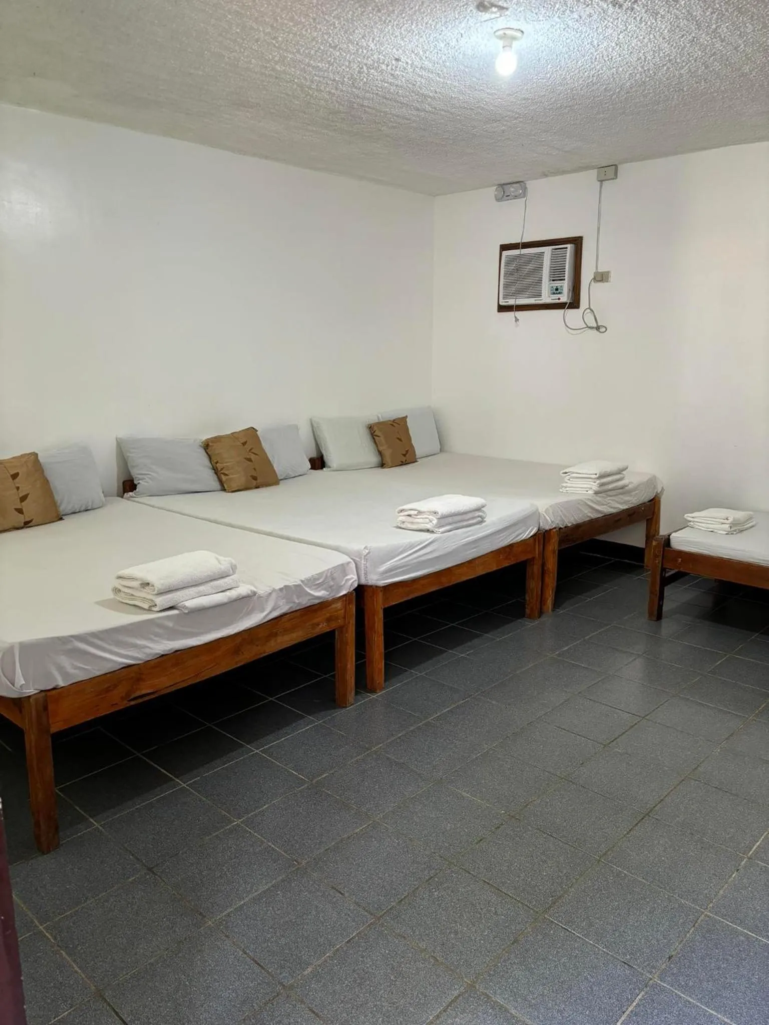 Bed in VILLA LOURDES RESORT