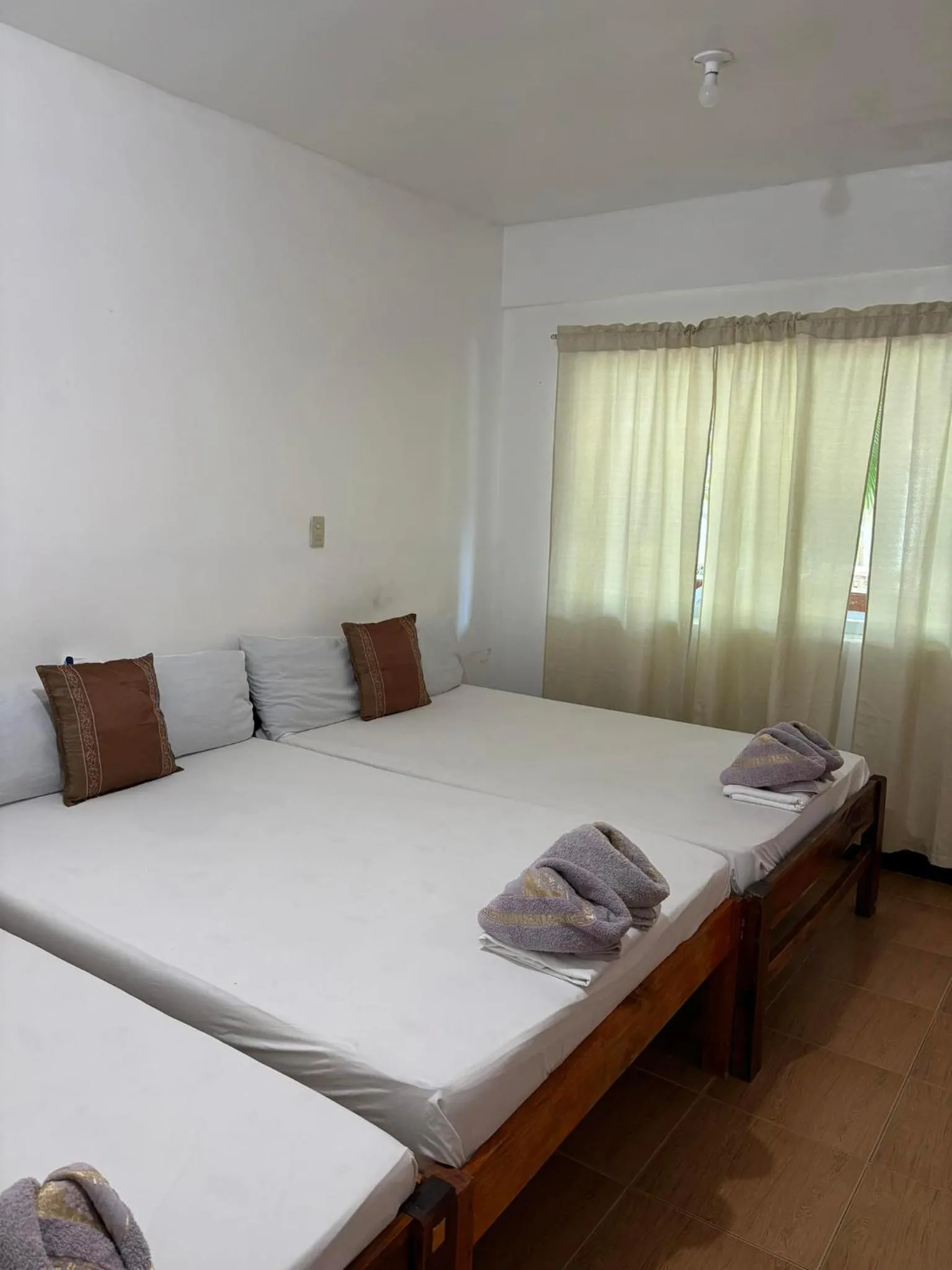 Bed in VILLA LOURDES RESORT