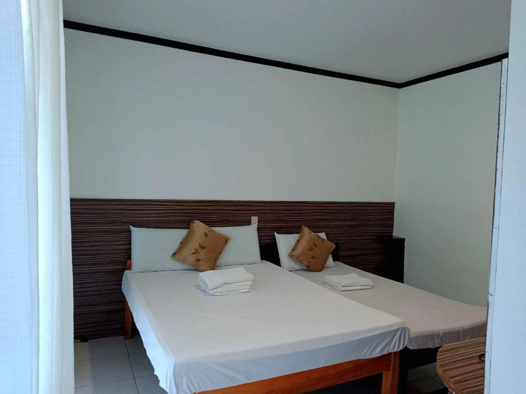 View (from property/room), Bed in VILLA LOURDES RESORT
