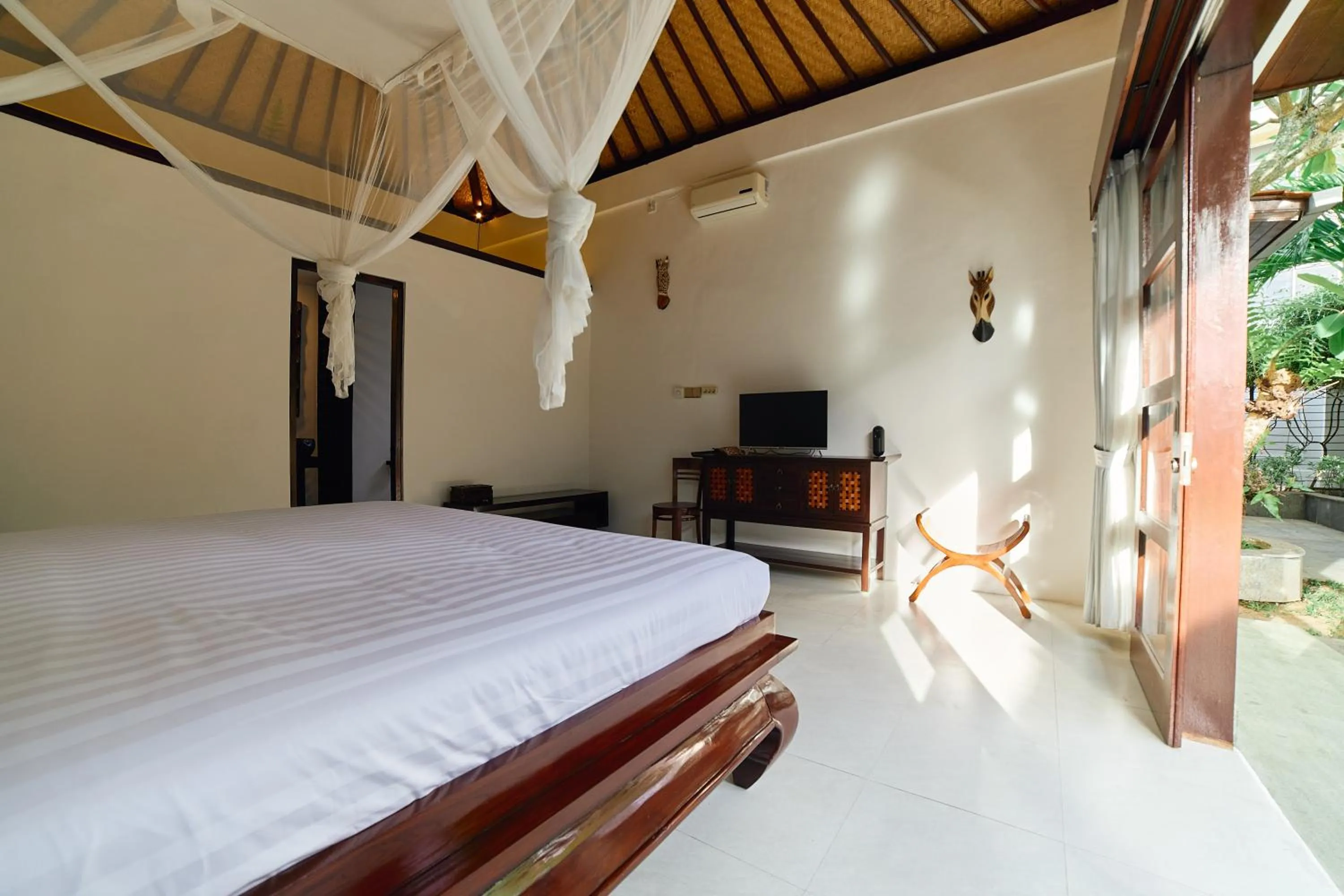 Bed in Cantik ArtVilla for big company by ArthouseBali