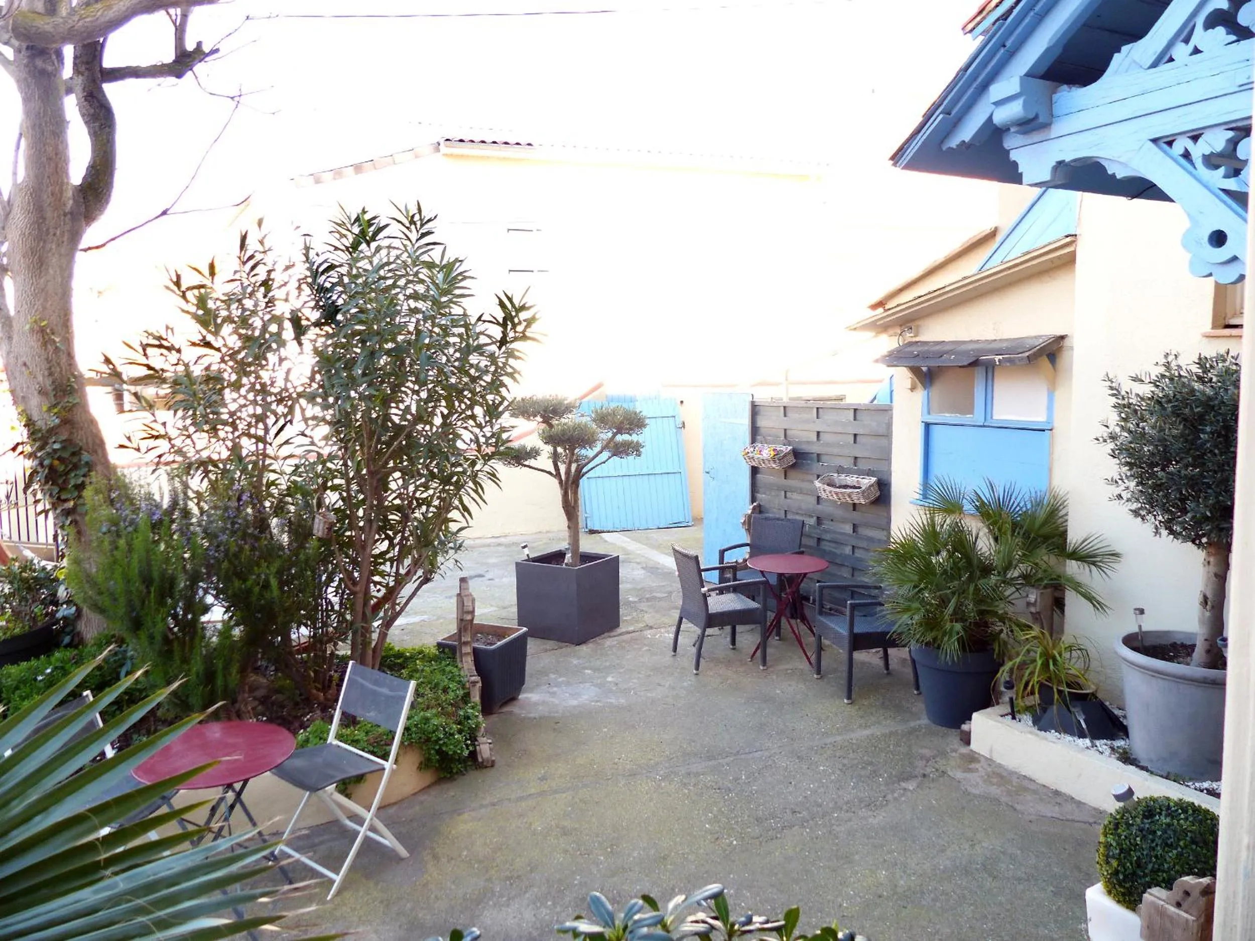 Garden view in Hôtel Le Chalet