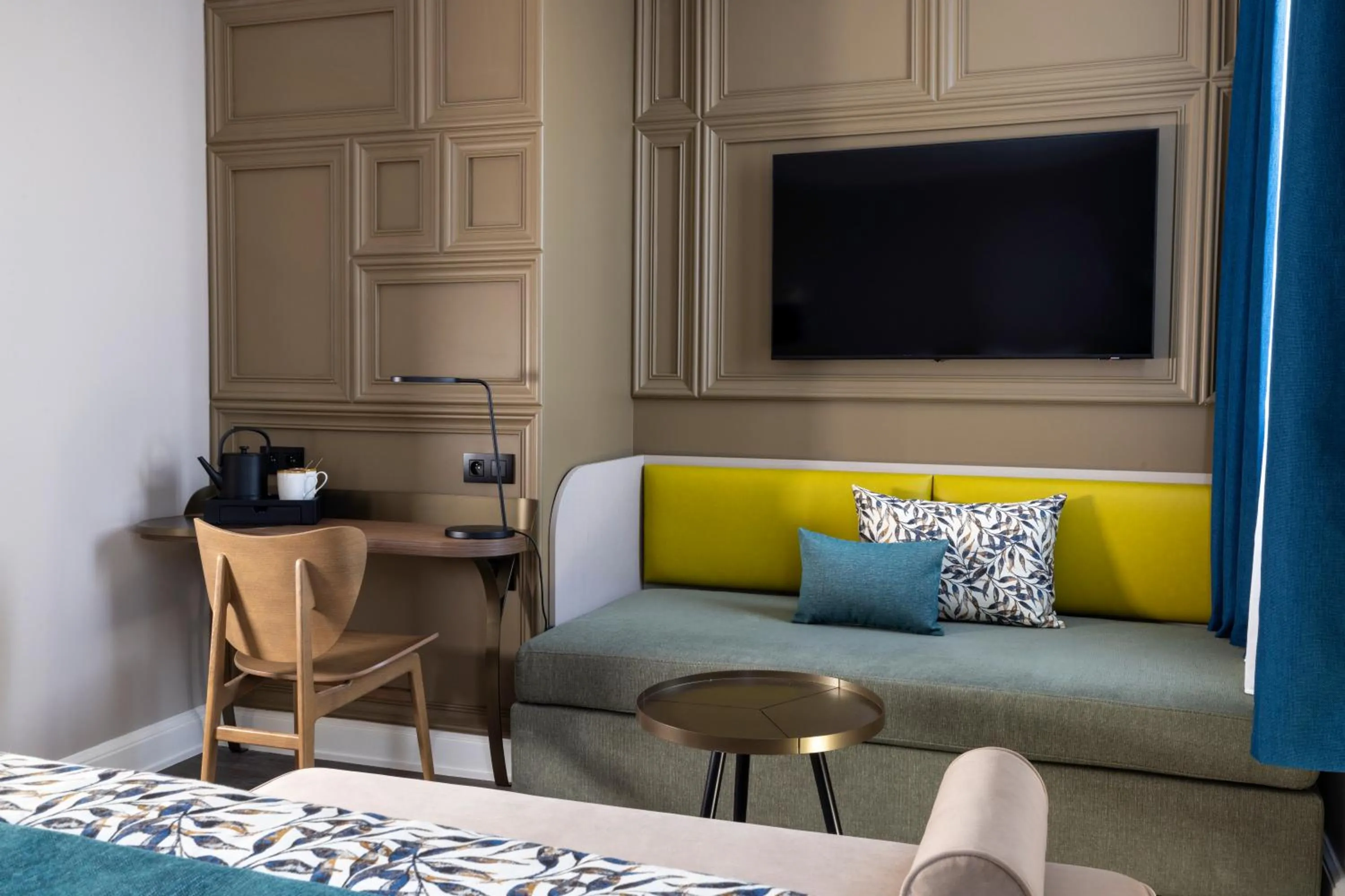 TV and multimedia in Hôtel L'Ormaie & Spa