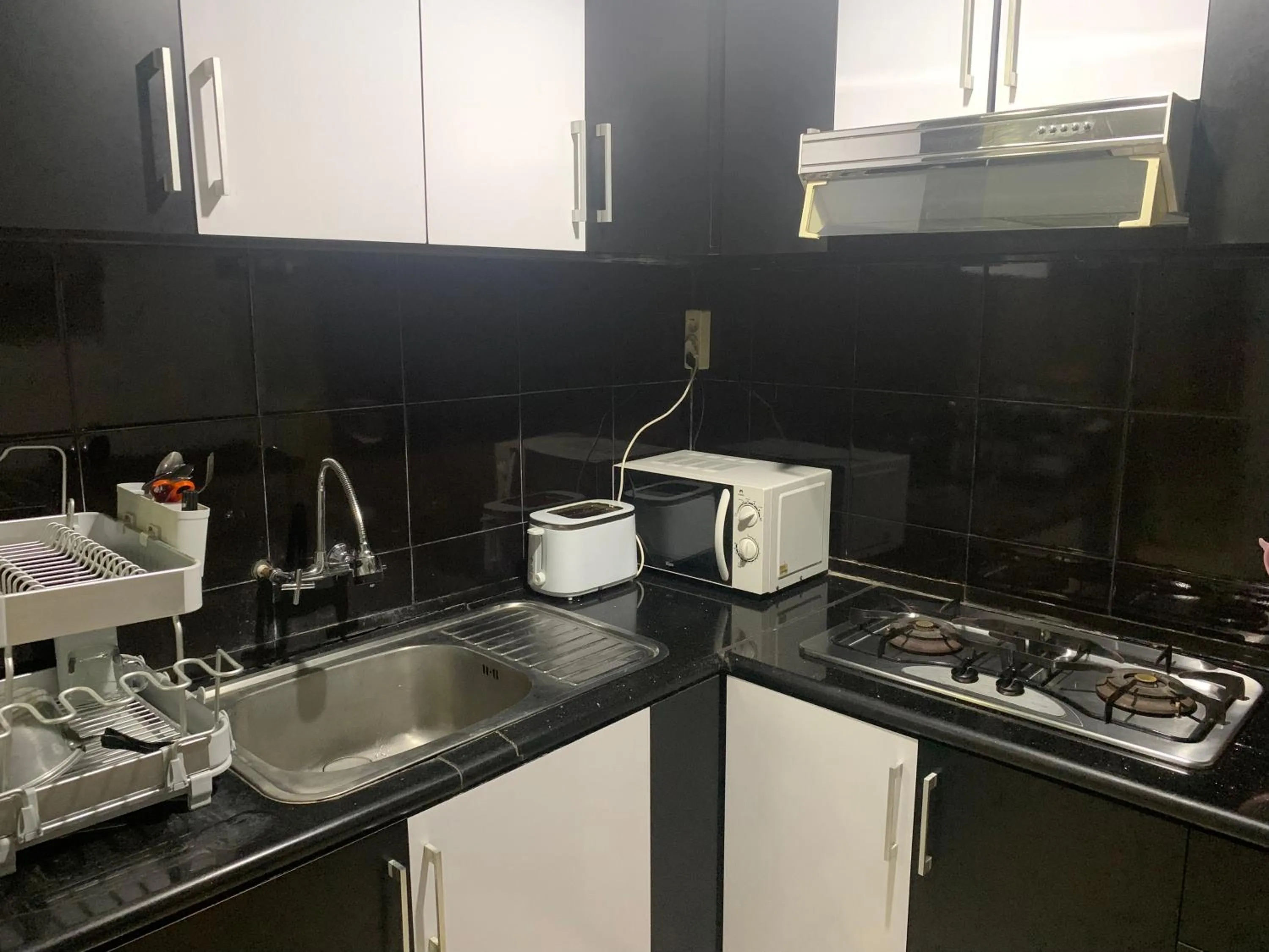 Kitchen or kitchenette in Cozy Palm Villa