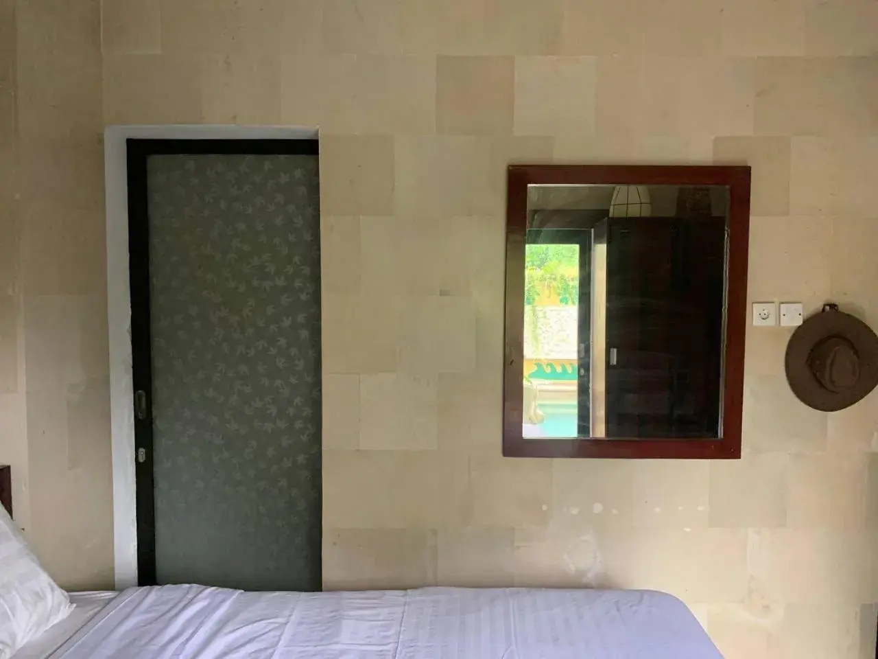 Bed in Cozy Palm Villa Bed in Cozy Palm Villa