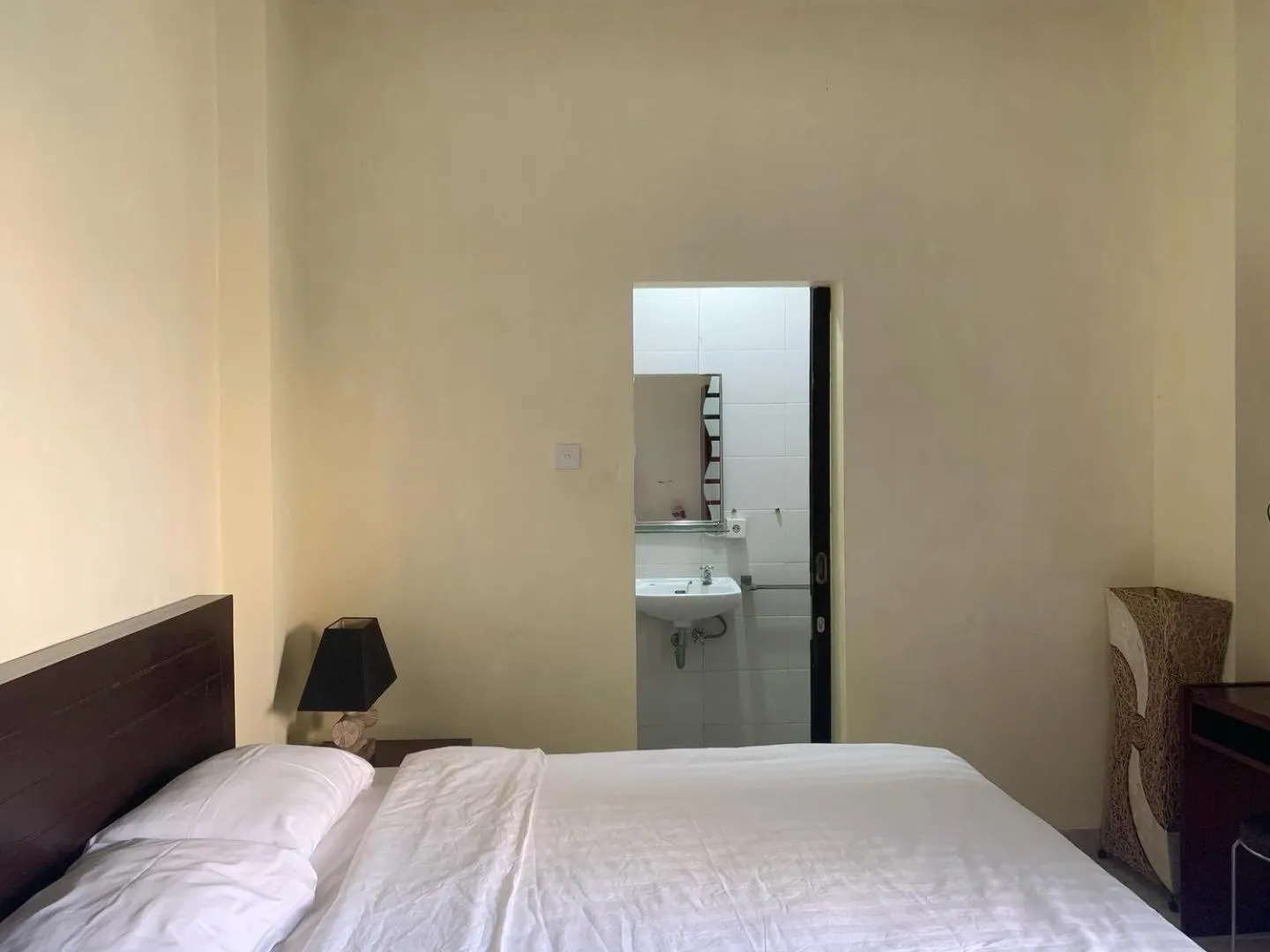 Bed in Cozy Palm Villa