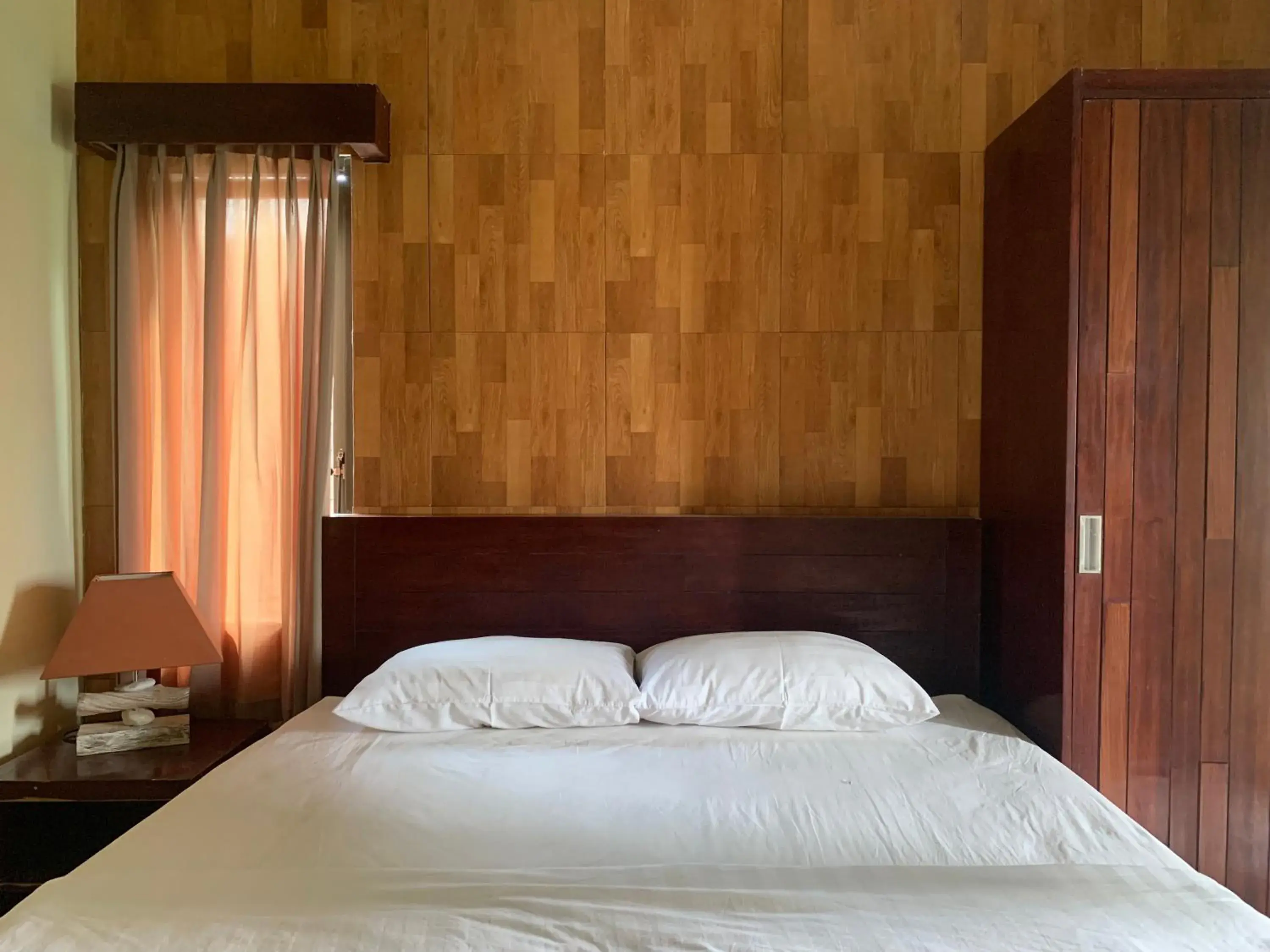 Bed in Cozy Palm Villa Bed in Cozy Palm Villa