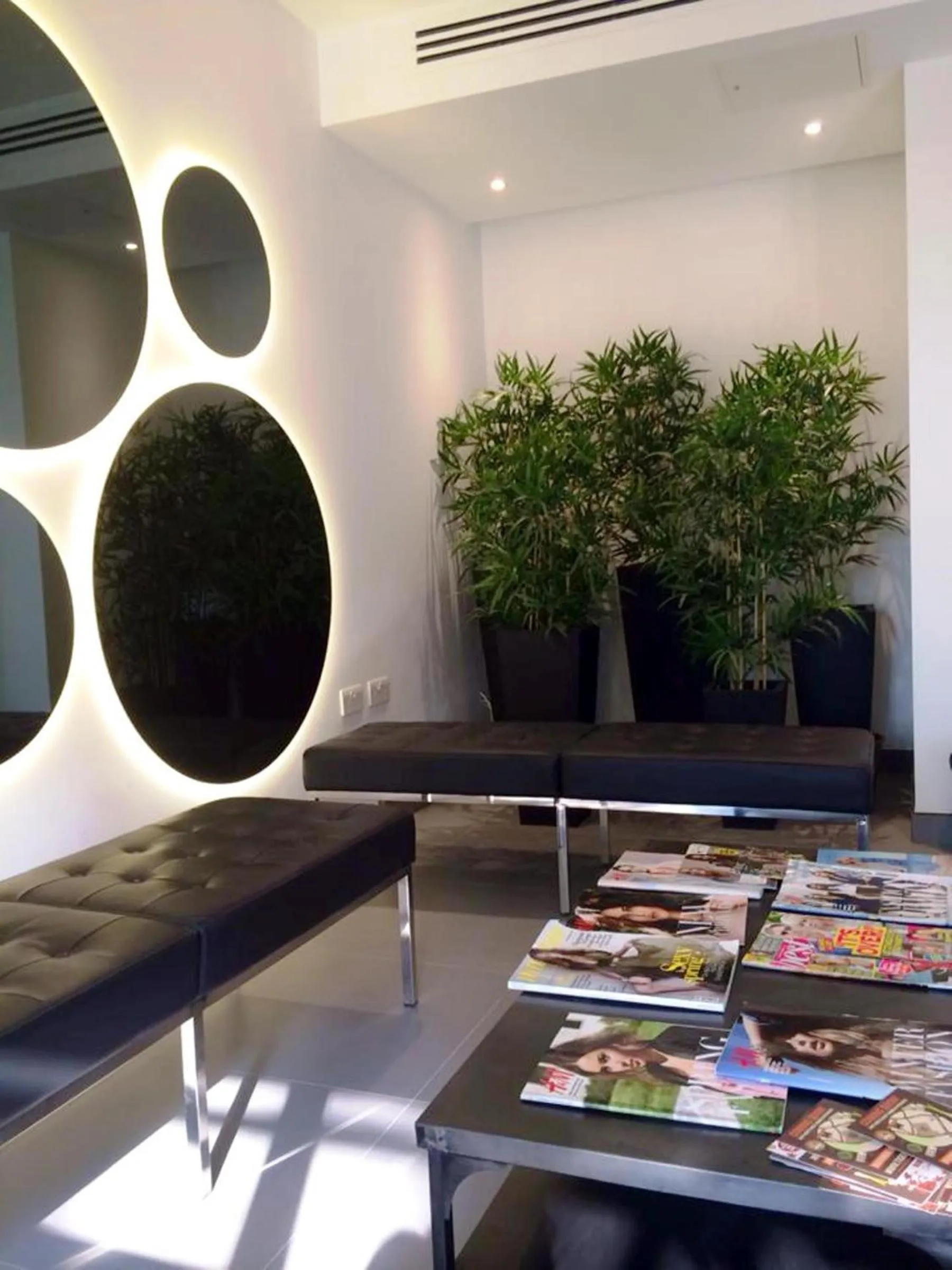 Communal lounge/ TV room in Pelican London Hotel and Residence