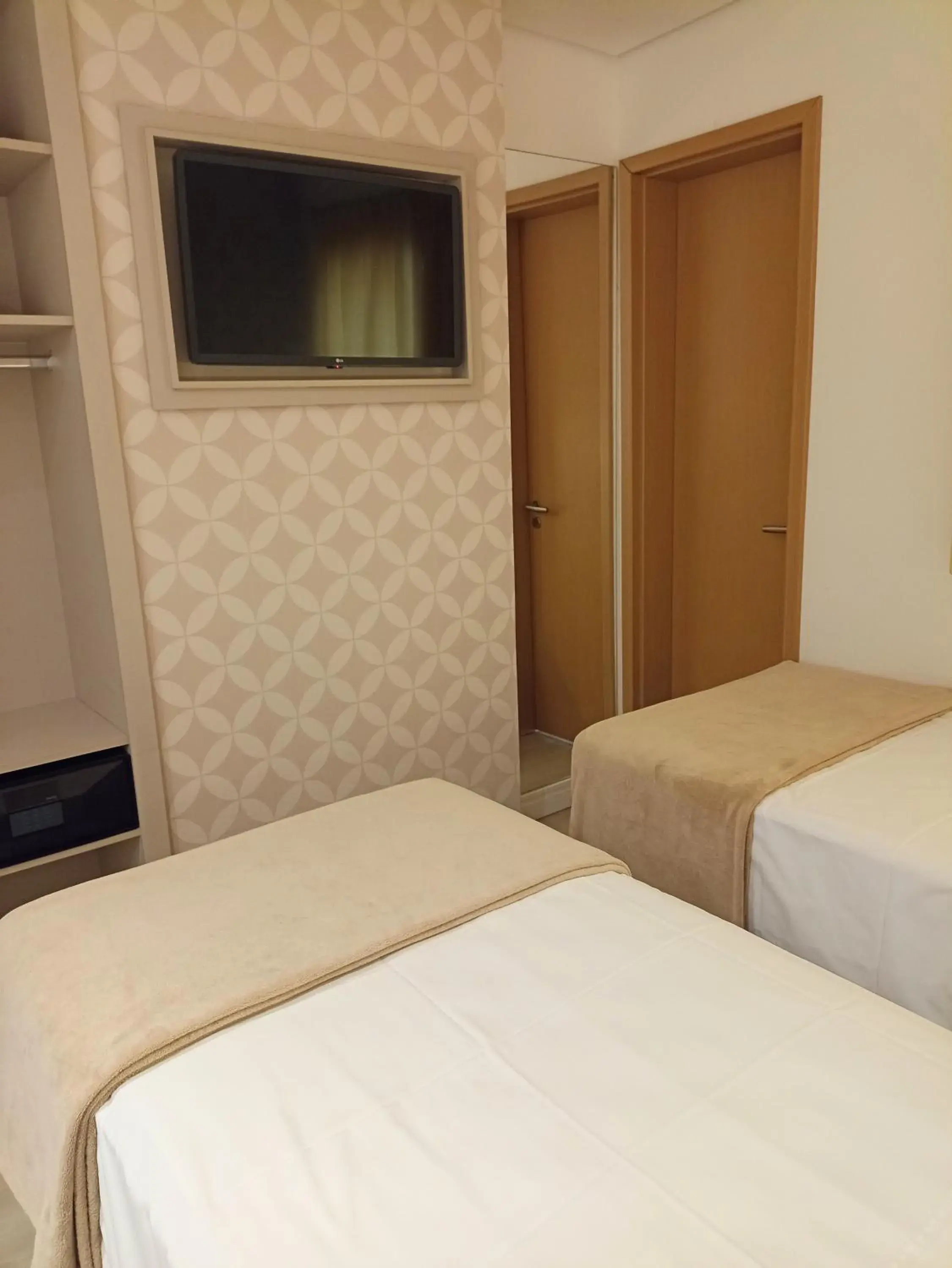 TV and multimedia, Bed in Hotel Arujá TV and multimedia, Bed in Hotel Arujá