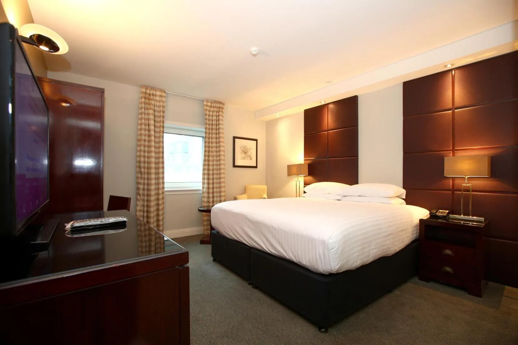 Communal lounge/ TV room, Bed in Stamford Bridge Hotel London