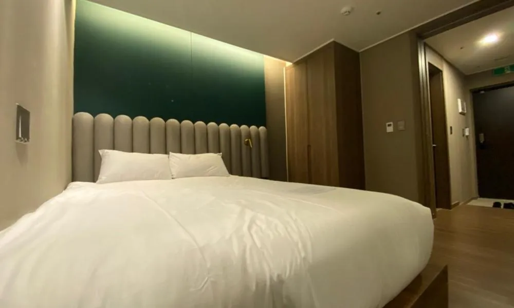 Bed in D OV Haeundae Hotel